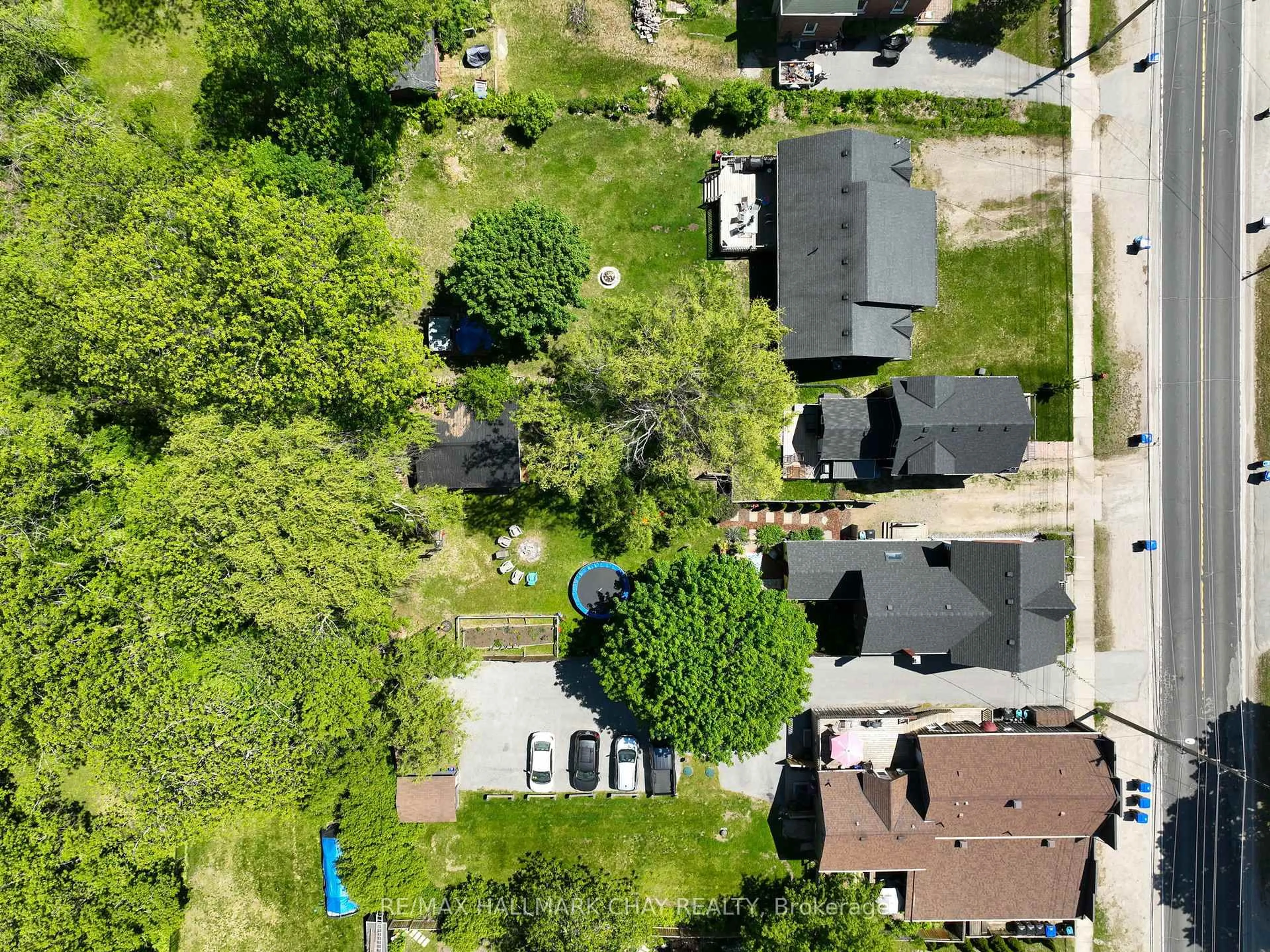 A pic from outside/outdoor area/front of a property/back of a property/a pic from drone, street for 8116 Main St, Adjala-Tosorontio Ontario L0L 1J0