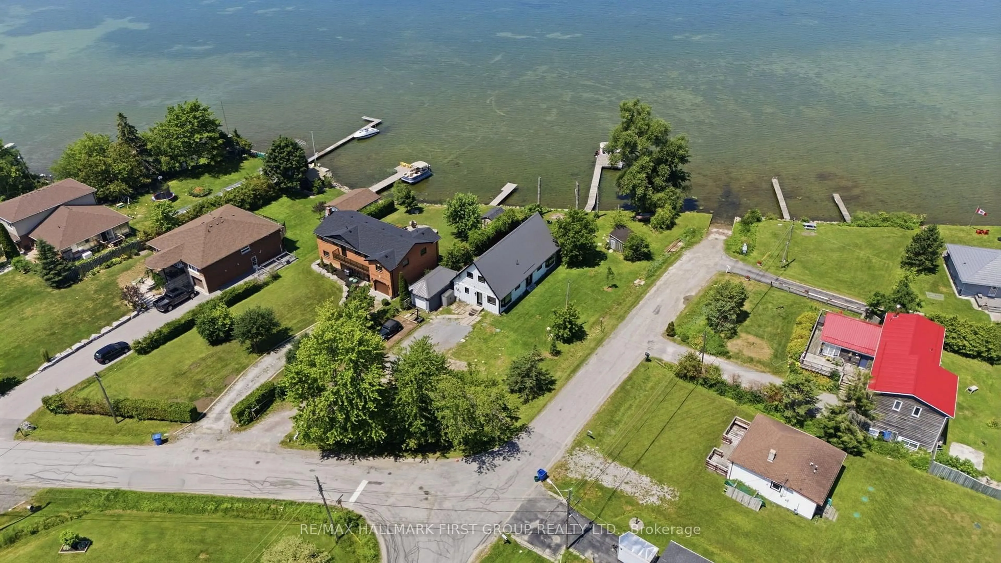 A pic from outside/outdoor area/front of a property/back of a property/a pic from drone, water/lake/river/ocean view for 26 Burnie Rd, Georgina Ontario L0E 1N0