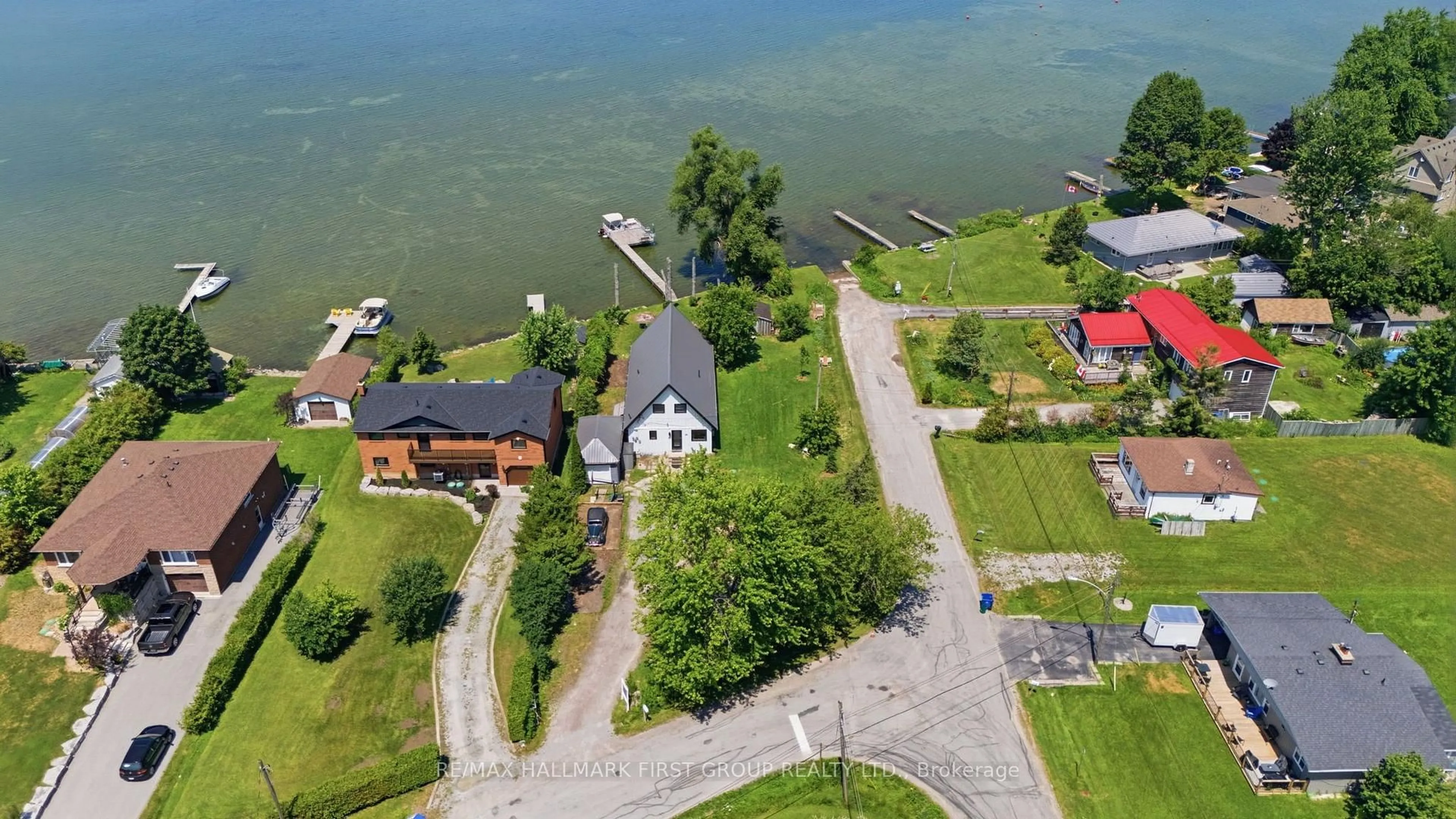 A pic from outside/outdoor area/front of a property/back of a property/a pic from drone, water/lake/river/ocean view for 26 Burnie Rd, Georgina Ontario L0E 1N0