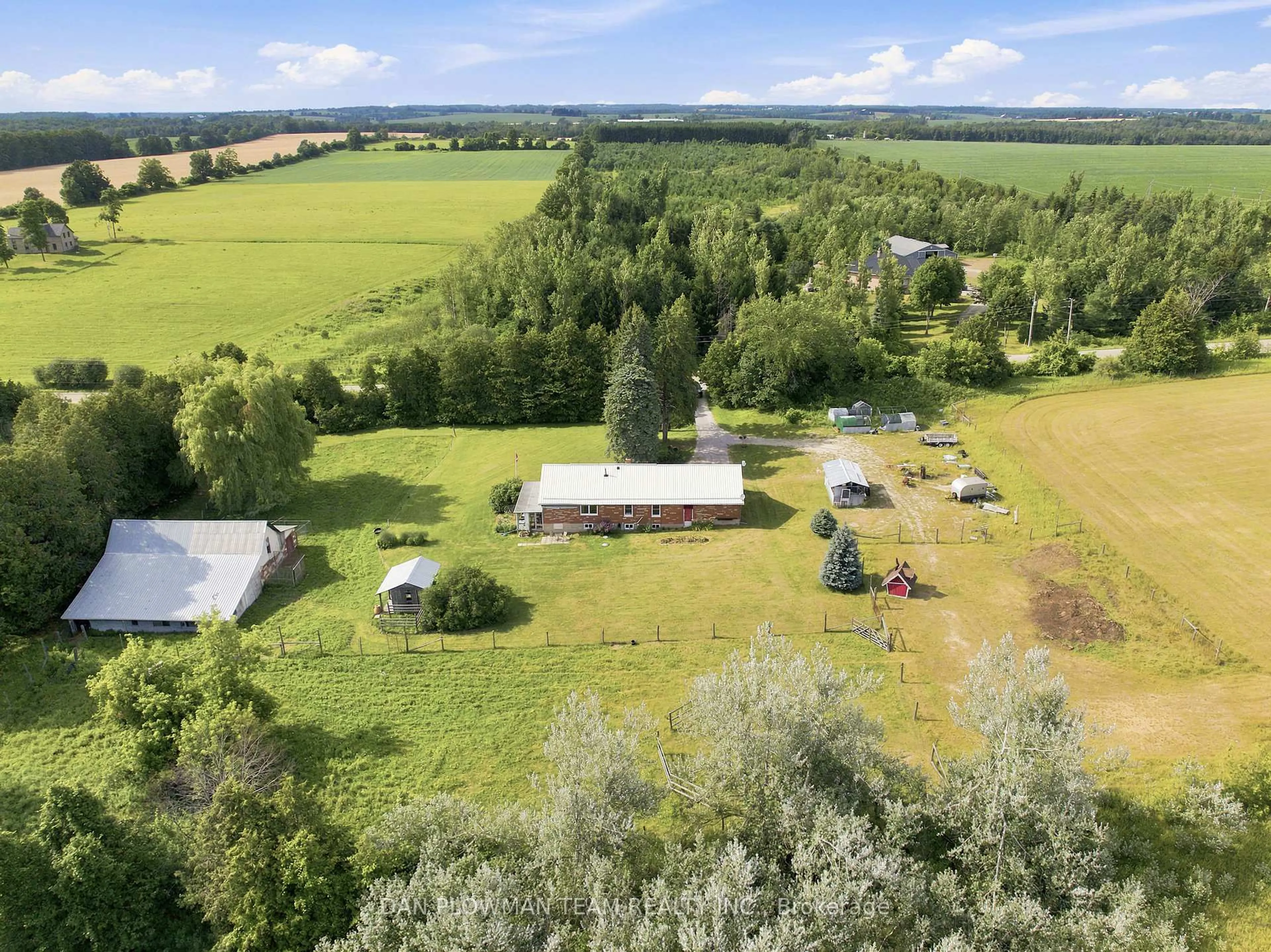 A pic from outside/outdoor area/front of a property/back of a property/a pic from drone, forest/trees view for 590S Brock Concession Rd 4 Rd, Brock Ontario L0C 1H0
