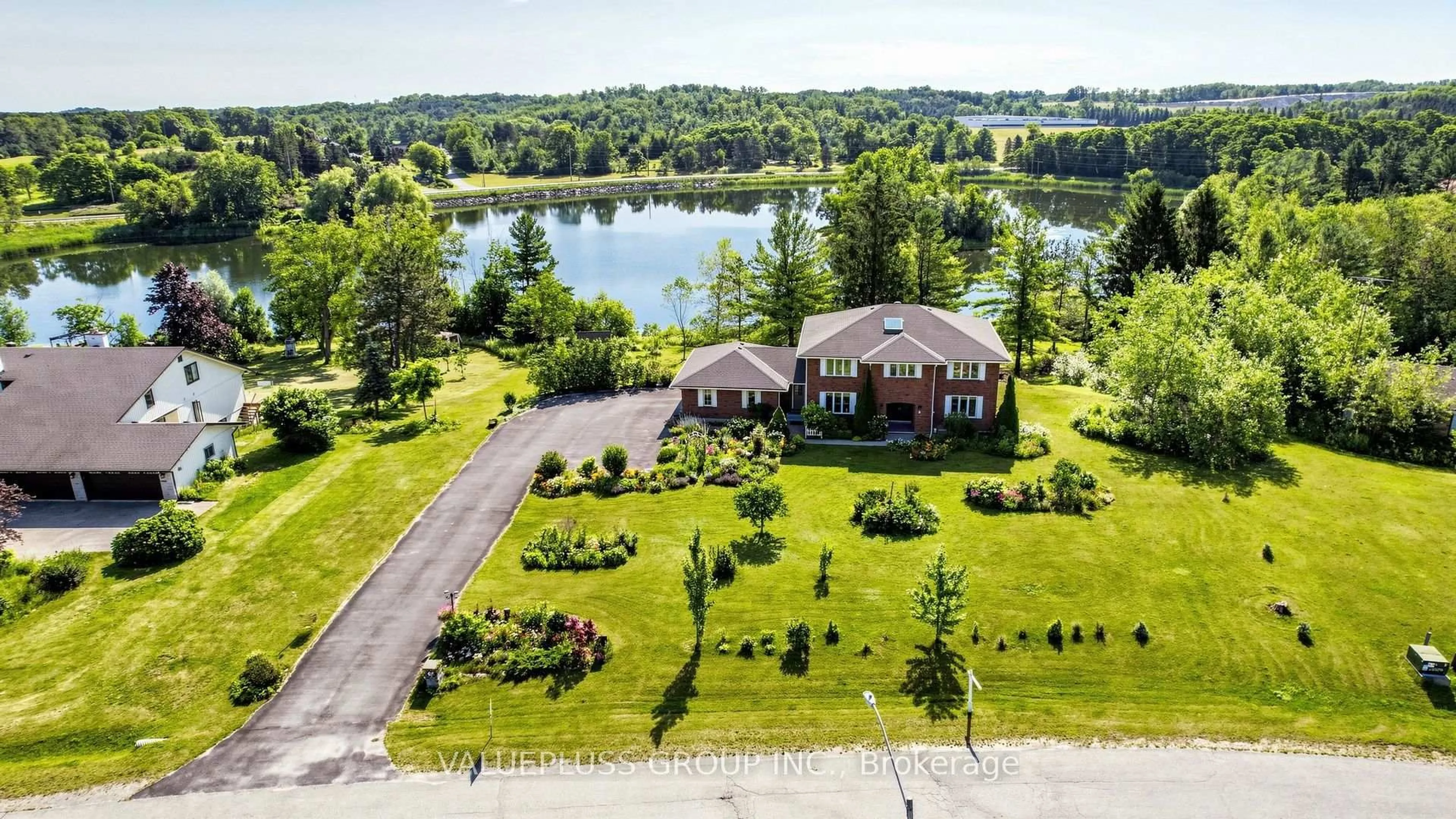 A pic from outside/outdoor area/front of a property/back of a property/a pic from drone, water/lake/river/ocean view for 9 Island Lake Dr, Whitchurch-Stouffville Ontario L4A 7X4