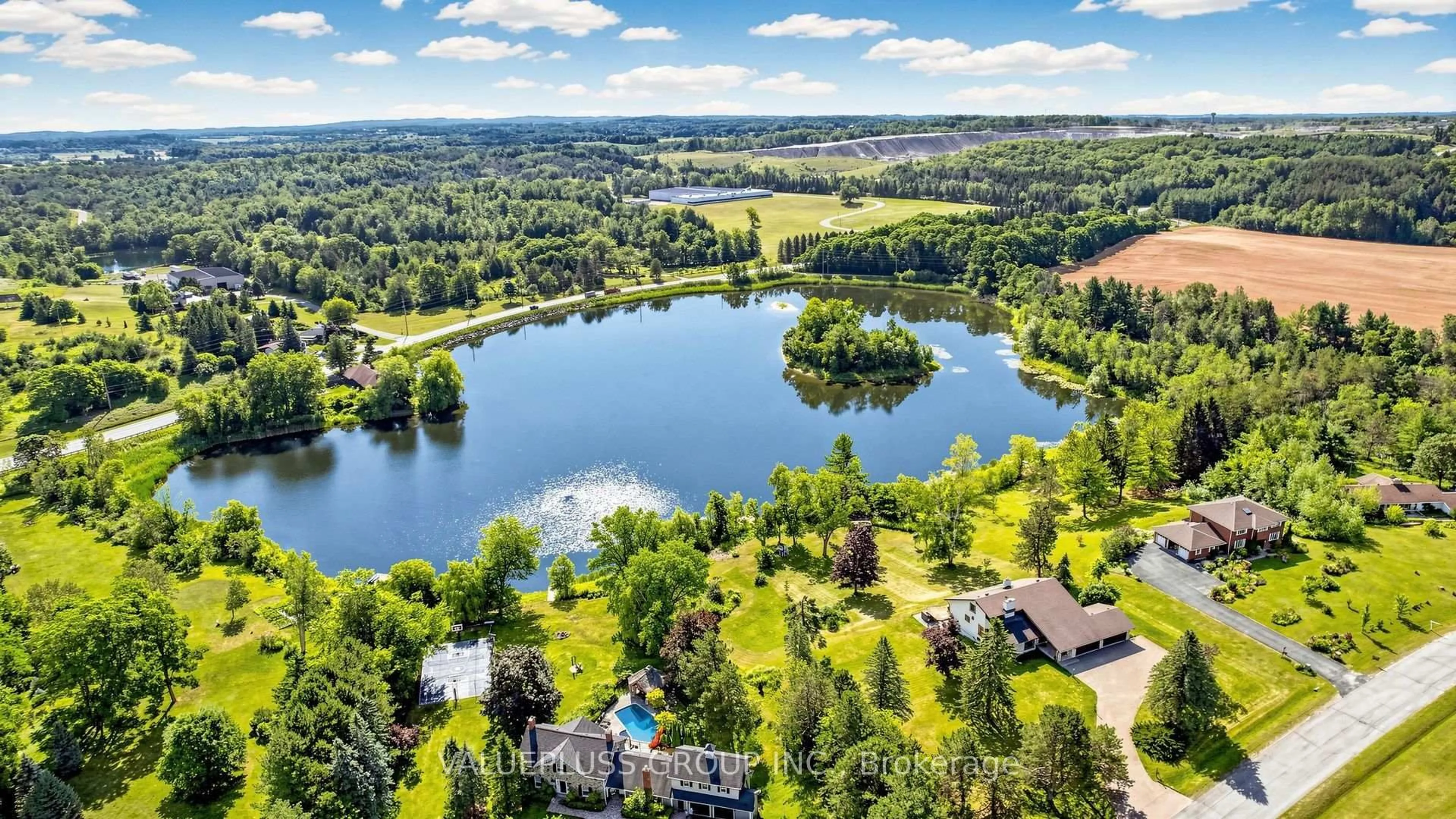 A pic from outside/outdoor area/front of a property/back of a property/a pic from drone, water/lake/river/ocean view for 9 Island Lake Dr, Whitchurch-Stouffville Ontario L4A 7X4