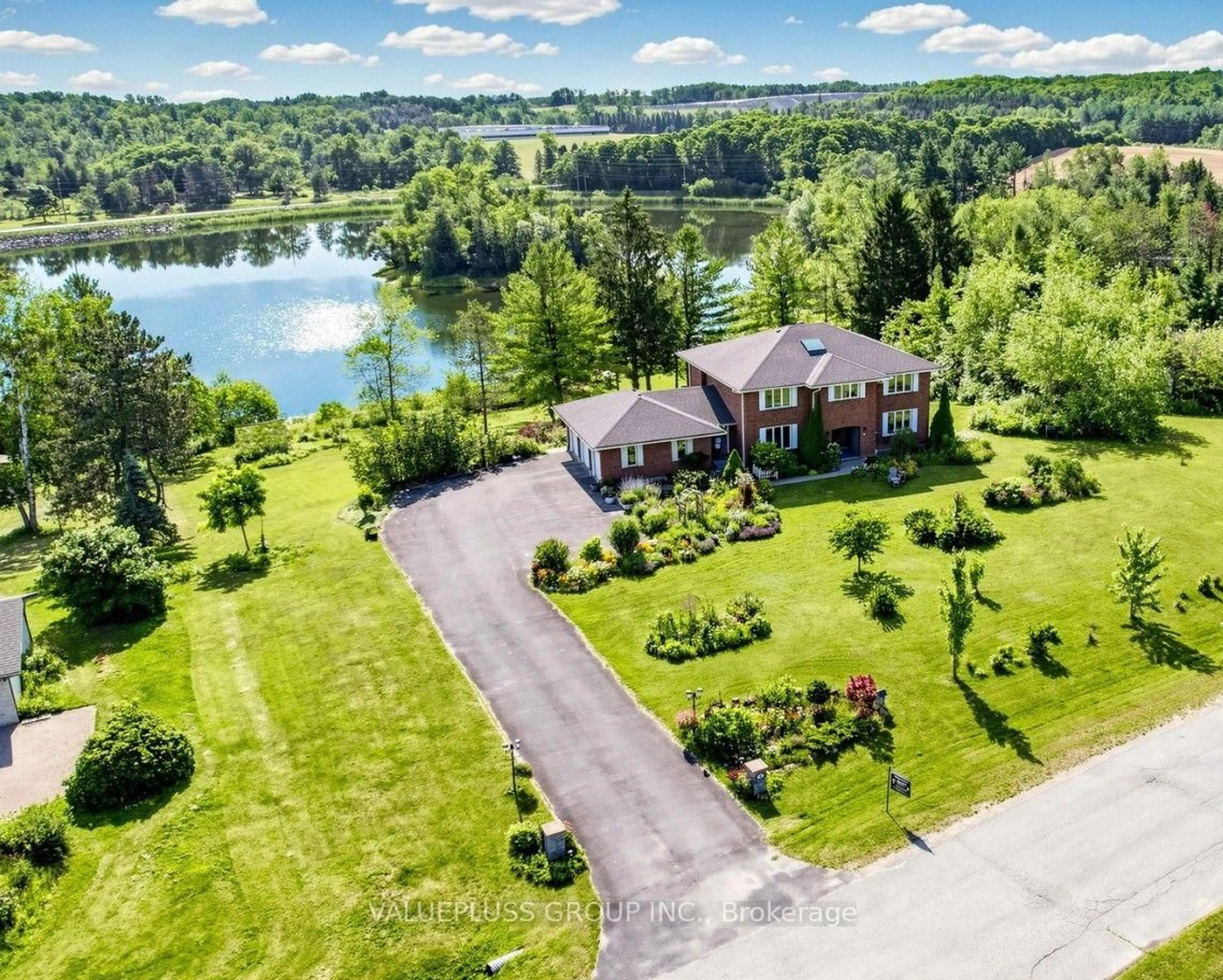 A pic from outside/outdoor area/front of a property/back of a property/a pic from drone, water/lake/river/ocean view for 9 Island Lake Dr, Whitchurch-Stouffville Ontario L4A 7X4