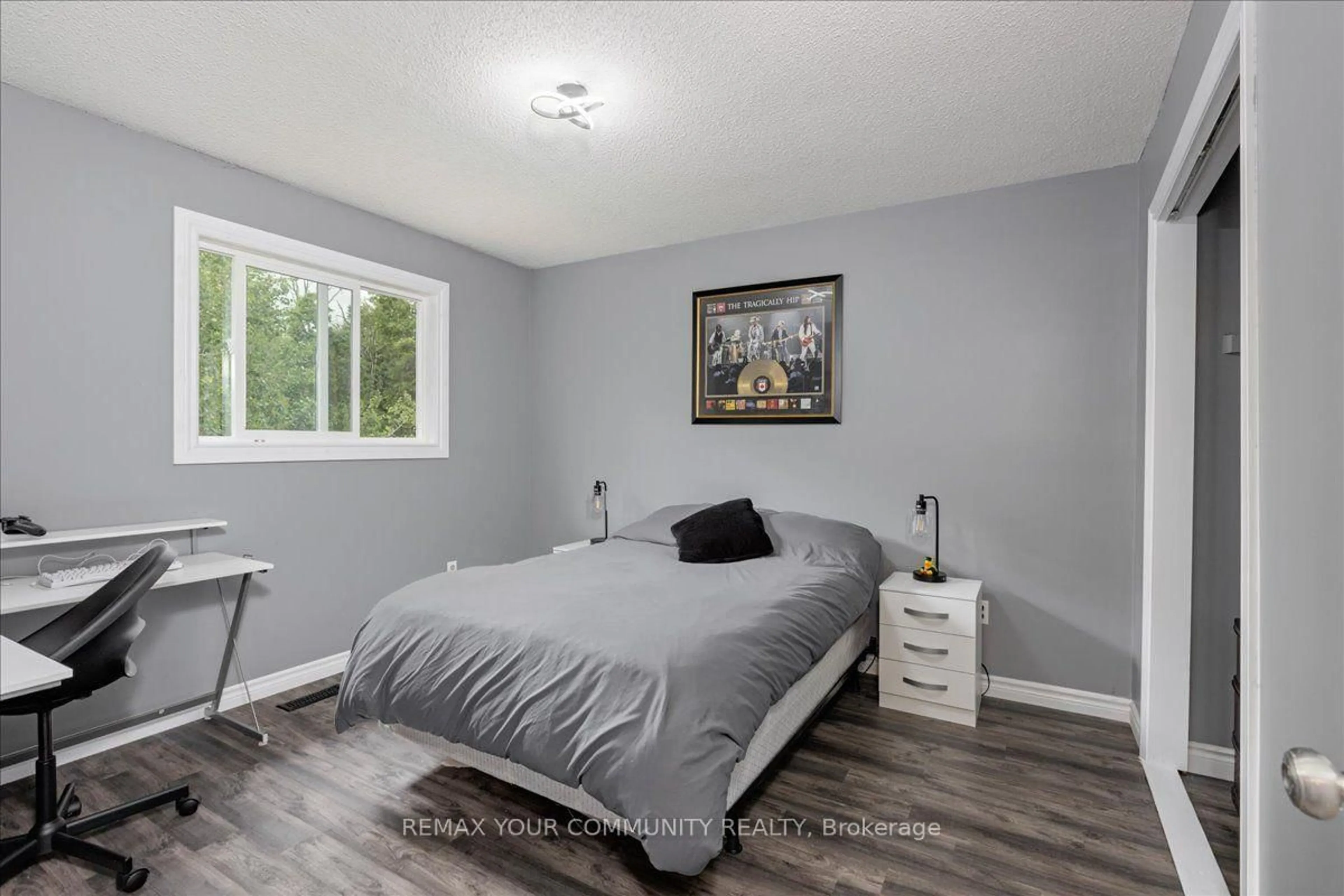 Bedroom with bed, wood/laminate floor for 1005 Vance Cres, Innisfil Ontario L0L 2M0