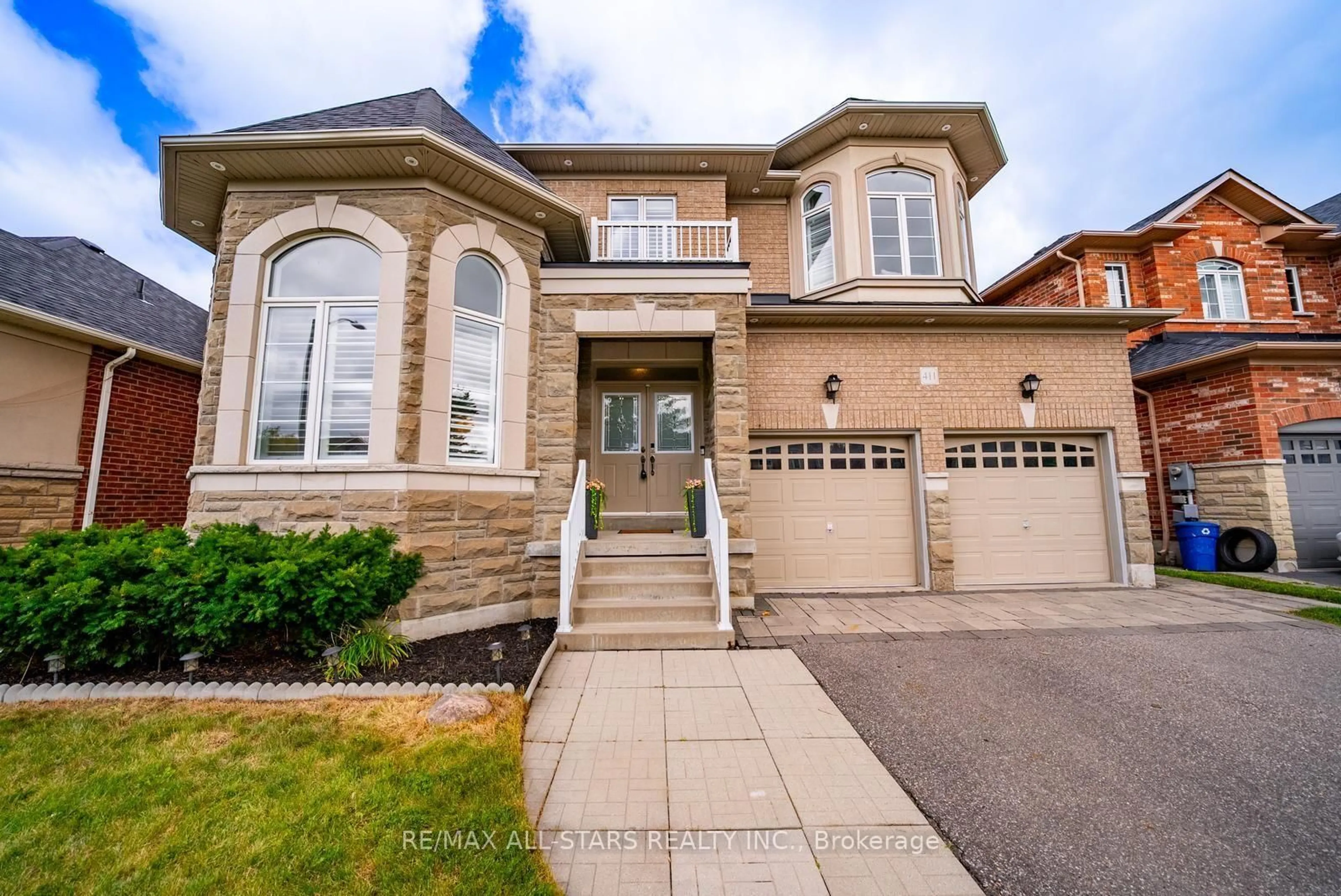 Home with brick exterior material, street for 411 Hoover Park Dr, Whitchurch-Stouffville Ontario L4A 1P4