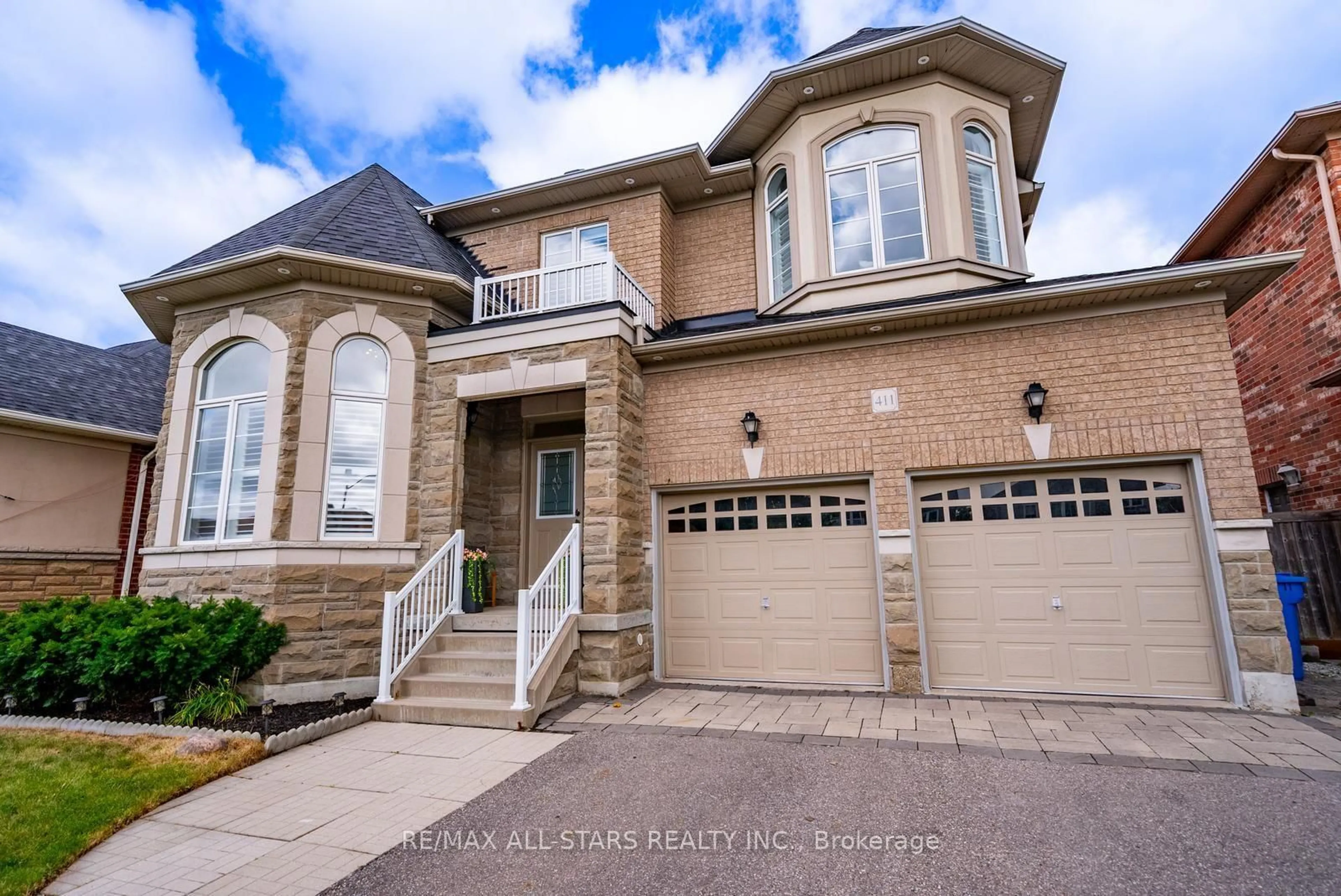 Home with brick exterior material, street for 411 Hoover Park Dr, Whitchurch-Stouffville Ontario L4A 1P4