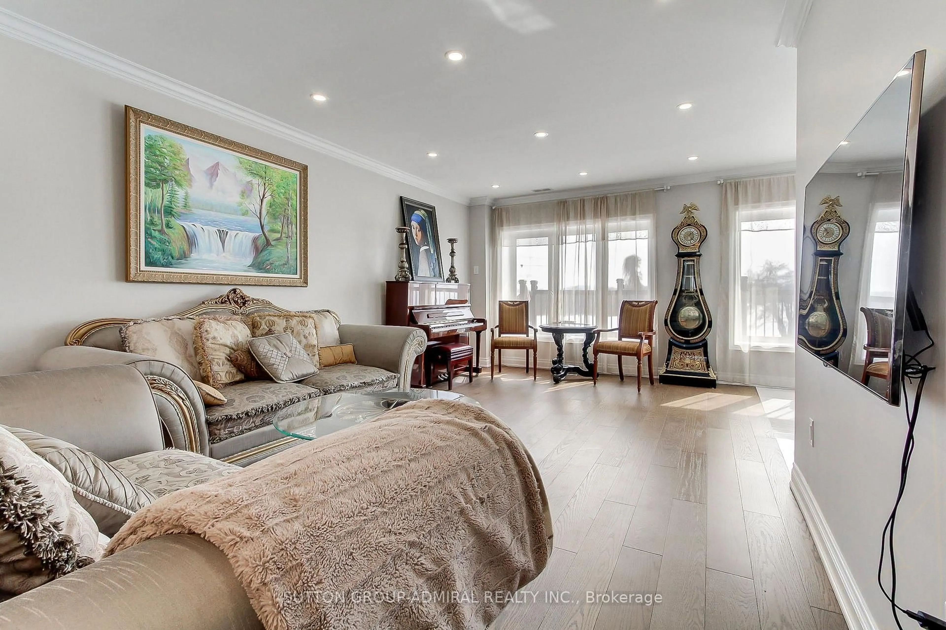 Living room with furniture, wood/laminate floor for 7205 19th Side Rd, King Ontario L0G 1T0