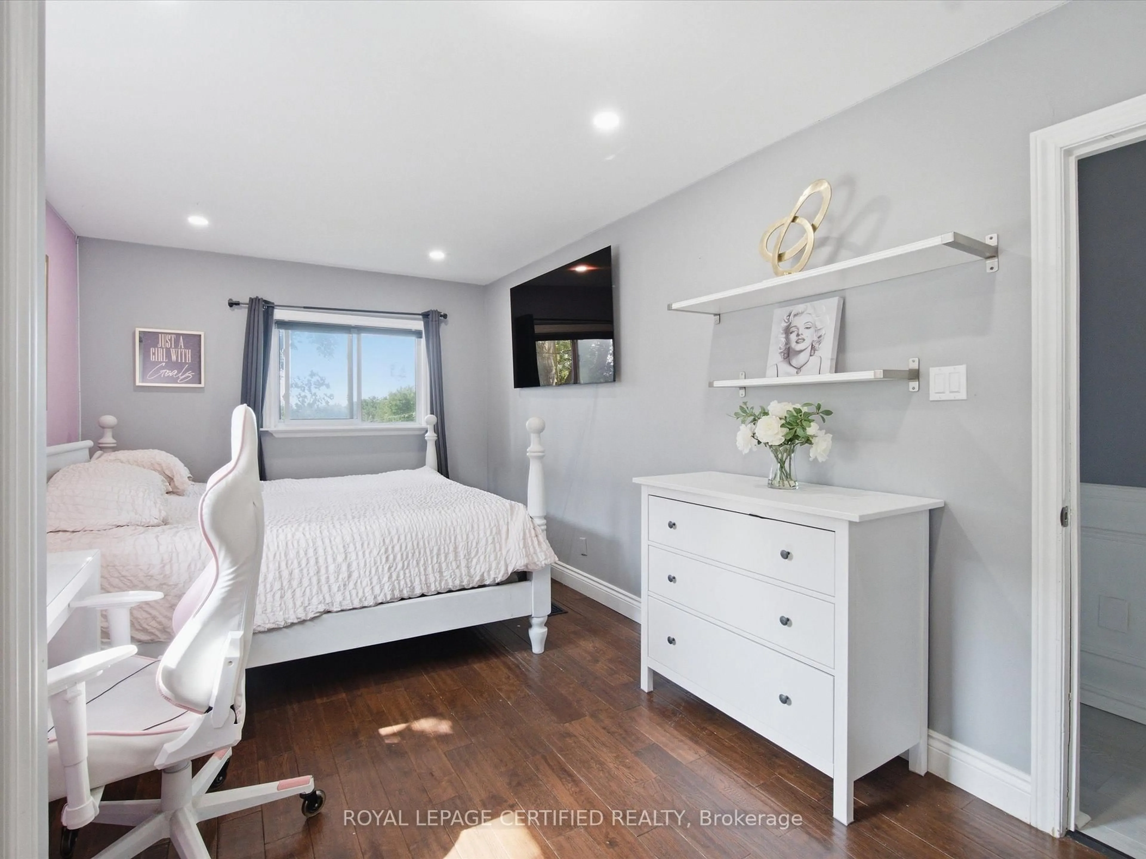 Bedroom with bed, wood/laminate floor for 288 Irene Dr, Georgina Ontario L4P 3B1