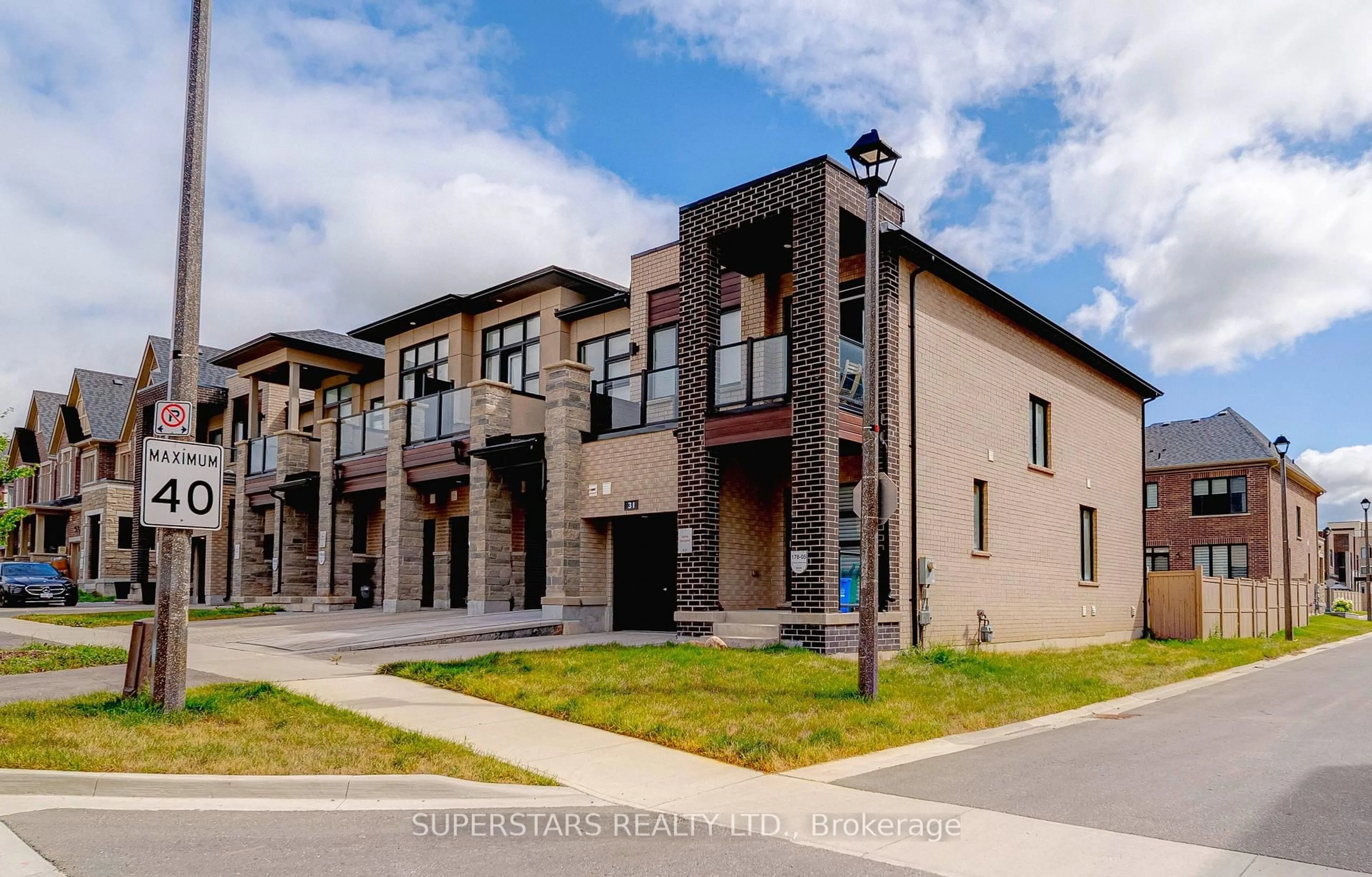 Home with brick exterior material, street for 31 Harvey Bunker Cres, Markham Ontario L6C 3K3