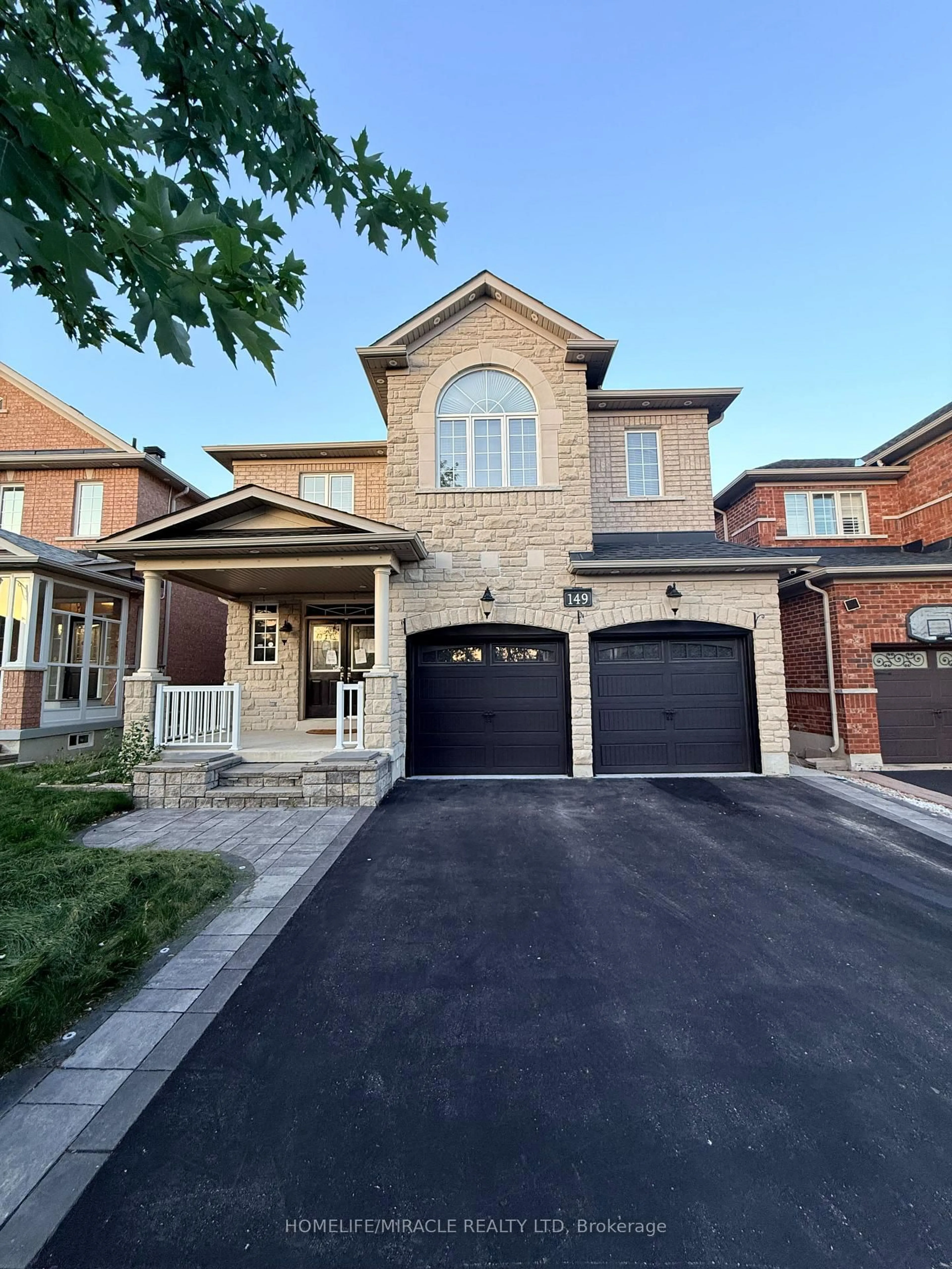 Home with brick exterior material, street for 149 Riverwalk Dr, Markham Ontario L6B 0E2