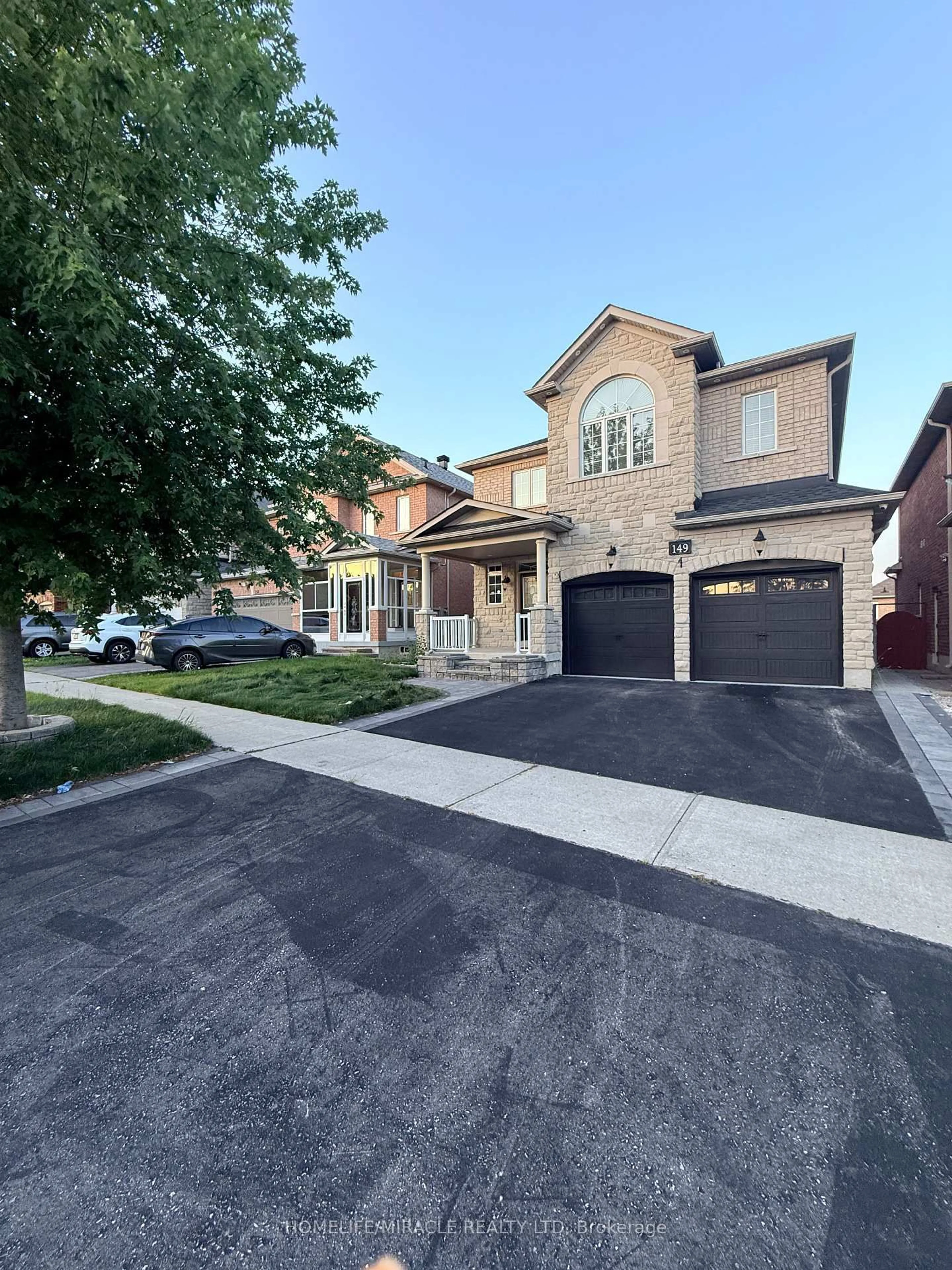 Home with brick exterior material, street for 149 Riverwalk Dr, Markham Ontario L6B 0E2