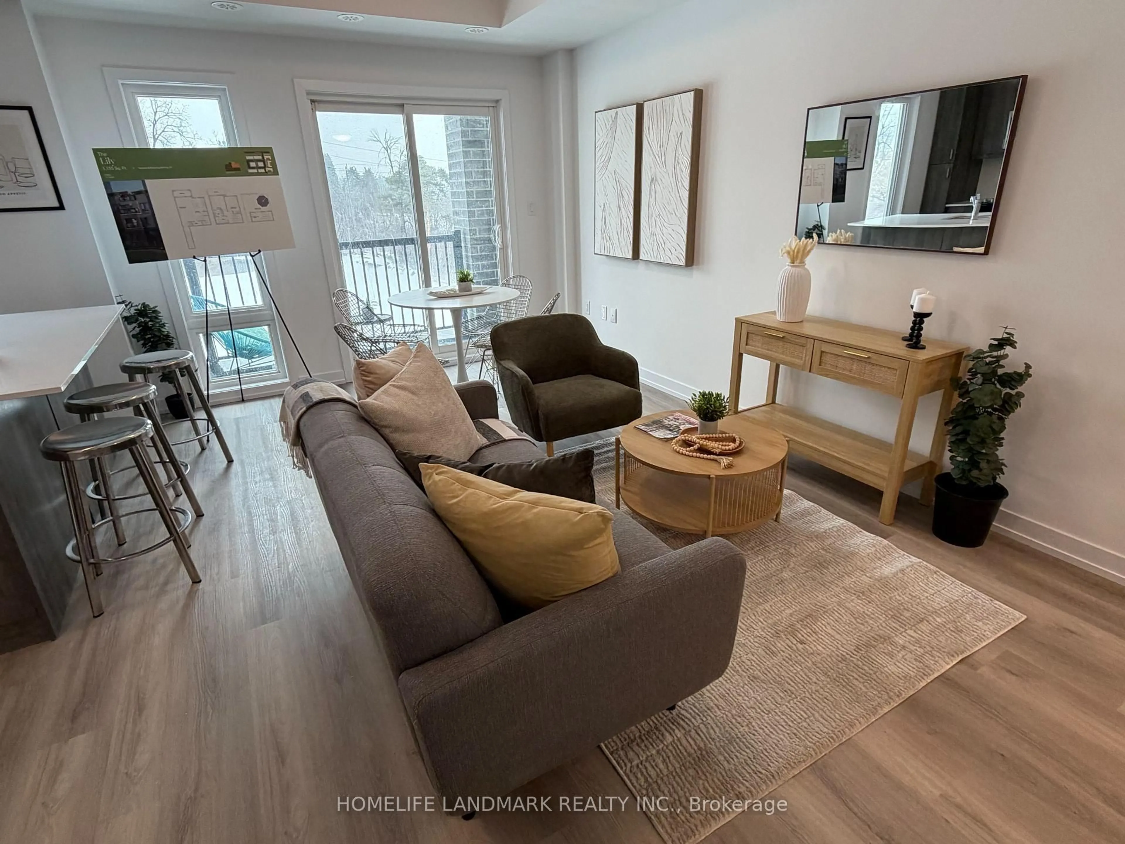Living room with furniture, wood/laminate floor for 51 Jefferson Sdrd #109, Richmond Hill Ontario L4E 1M1
