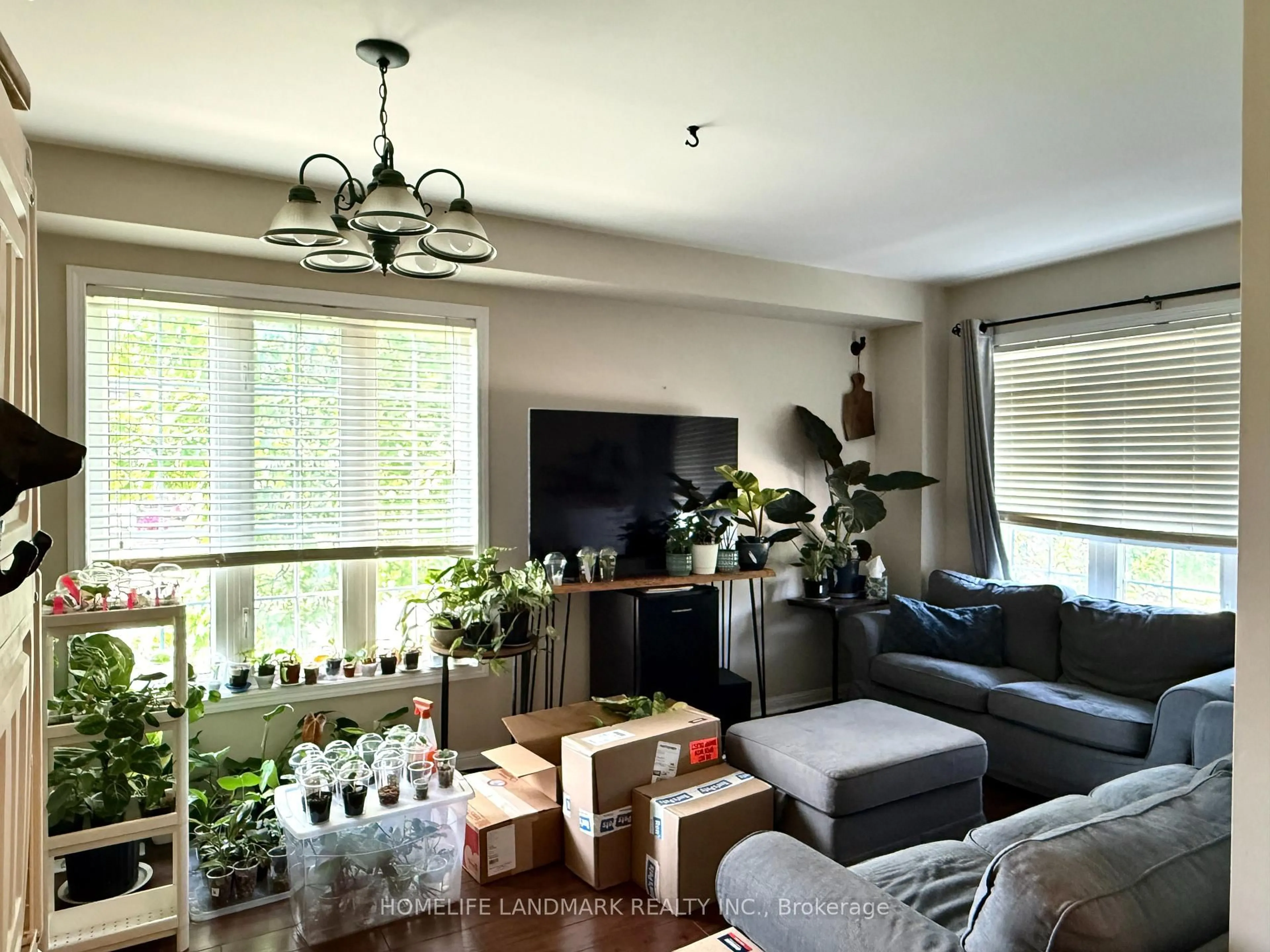 Living room with furniture, wood/laminate floor for 350 Gilpin Dr, Newmarket Ontario L3X 3H2