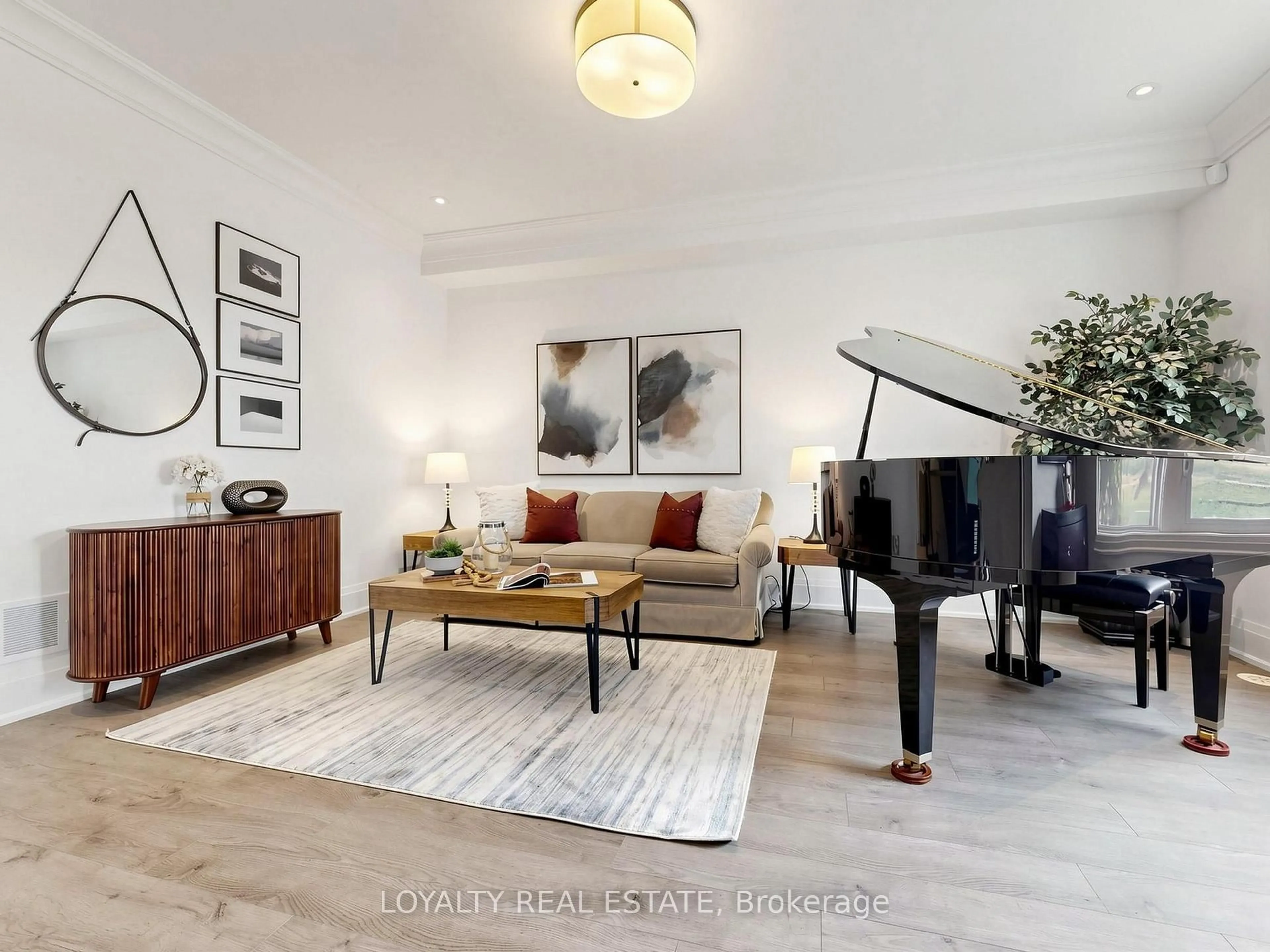 Living room with furniture, wood/laminate floor for 52 South Park Rd, Markham Ontario L3T 0G6