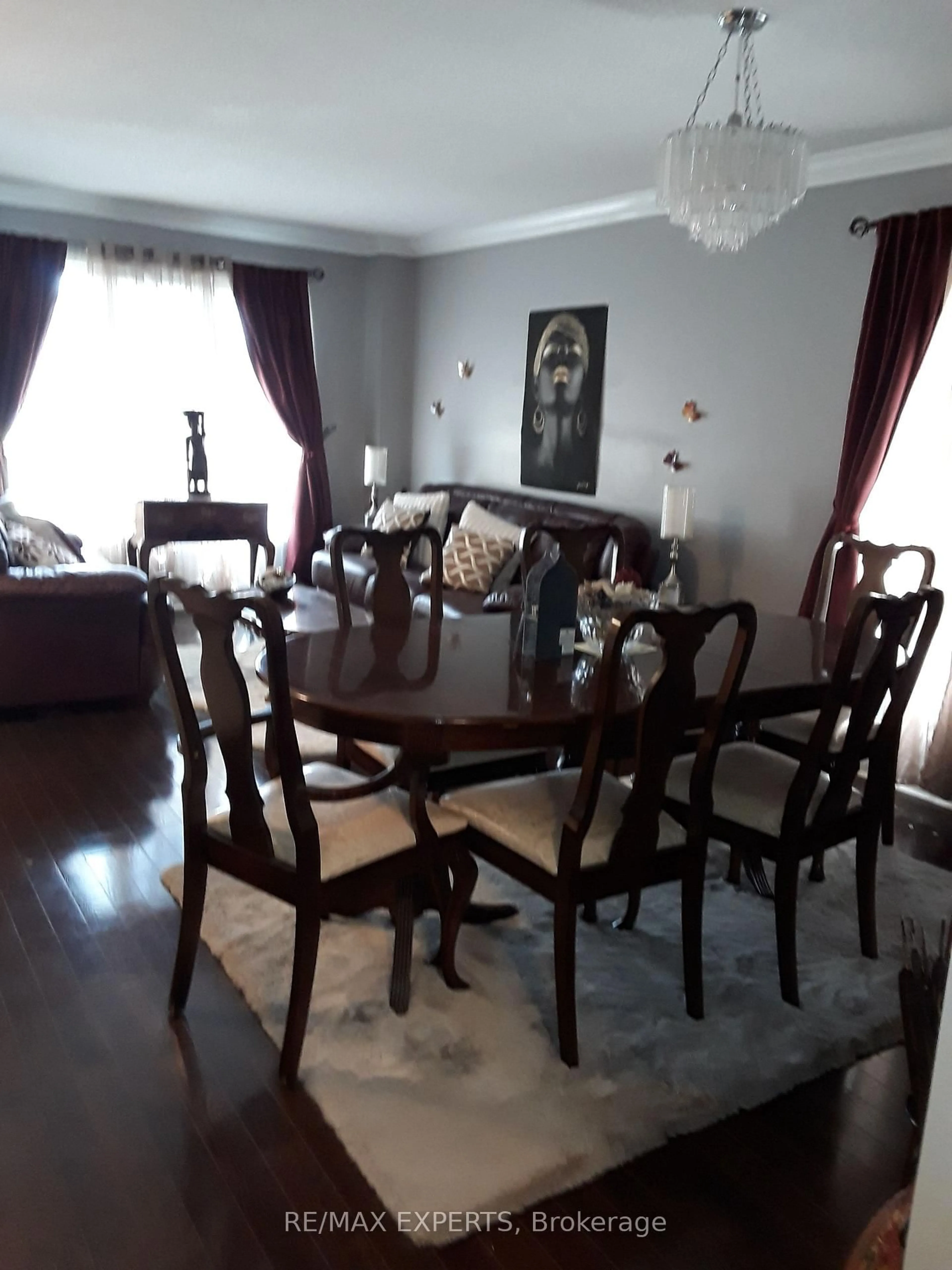 Dining room, wood/laminate floor for 2328 Bur Oak Ave, Markham Ontario L6E 1L7