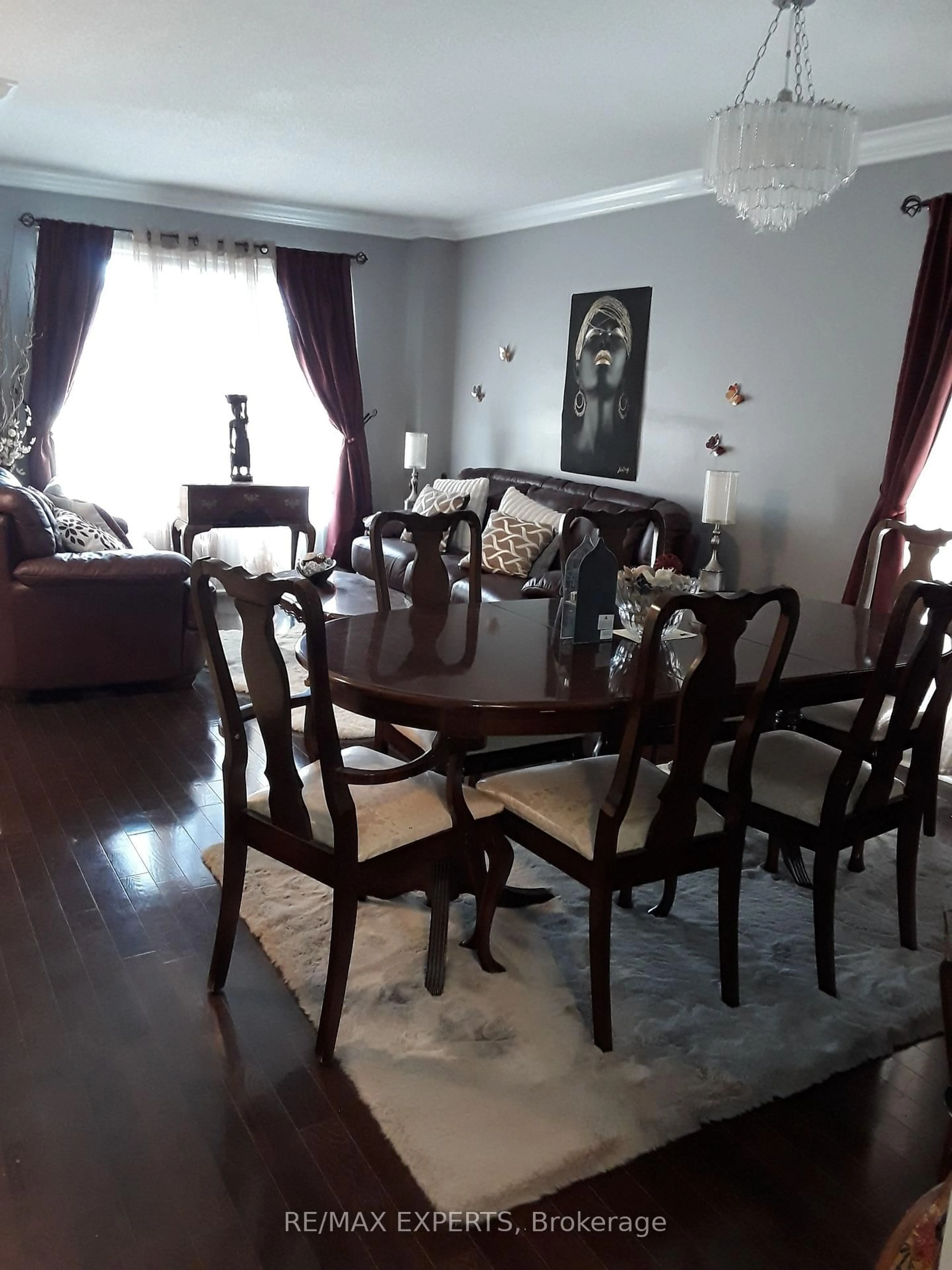 Dining room, wood/laminate floor for 2328 Bur Oak Ave, Markham Ontario L6E 1L7
