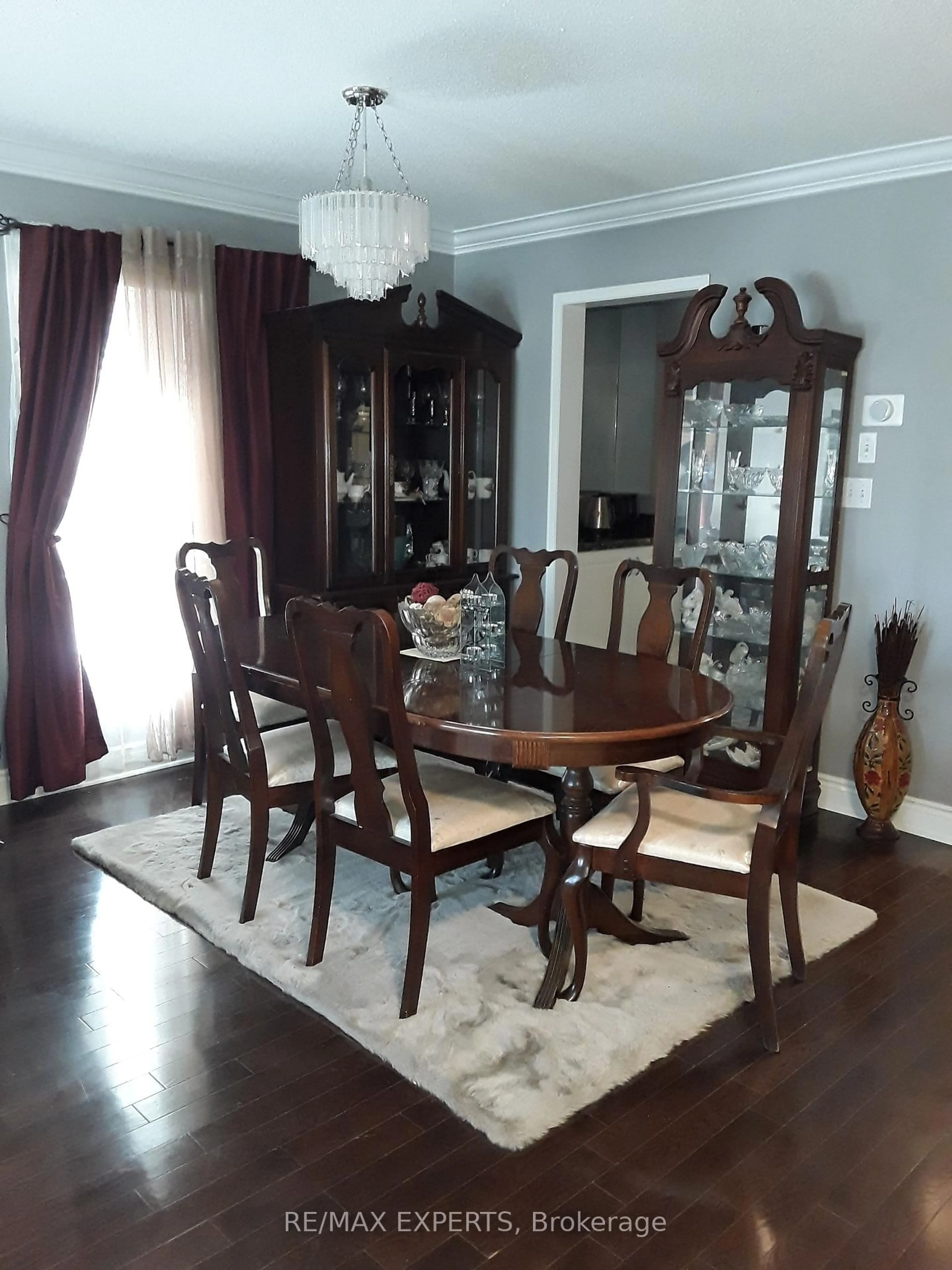 Dining room, wood/laminate floor for 2328 Bur Oak Ave, Markham Ontario L6E 1L7
