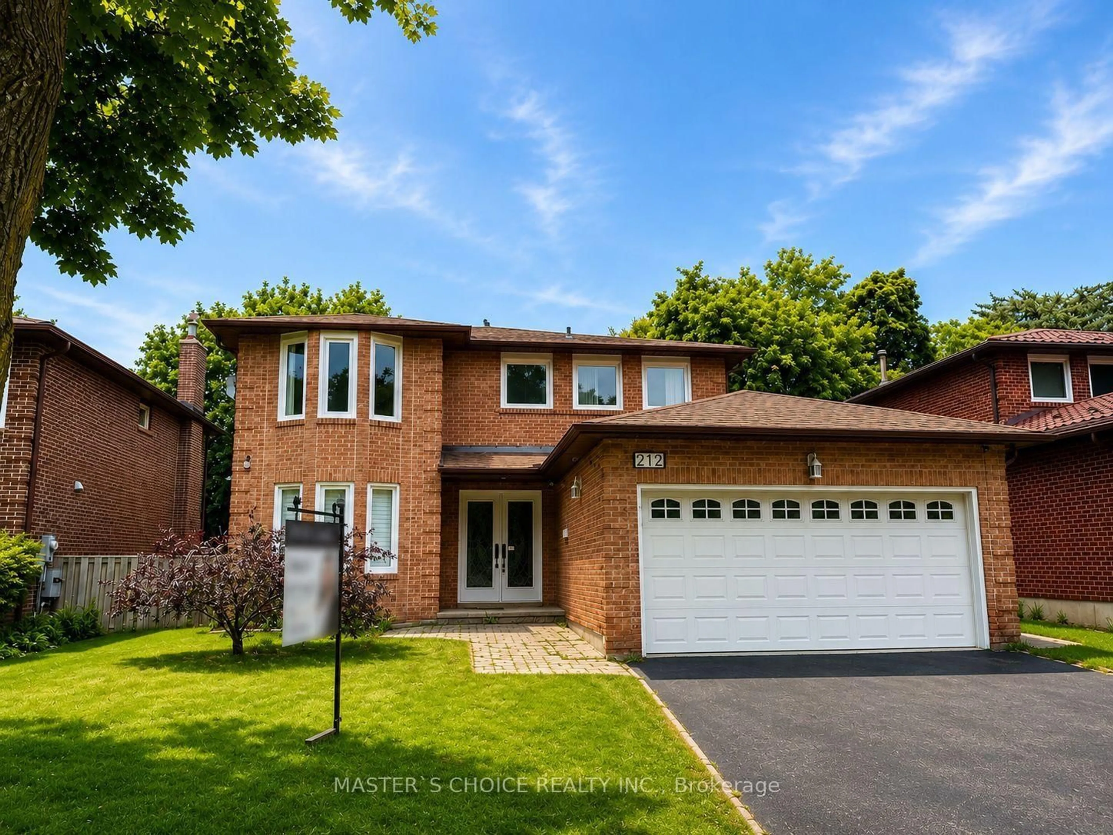 Home with brick exterior material, street for 212 Fincham Ave, Markham Ontario L3P 4B5