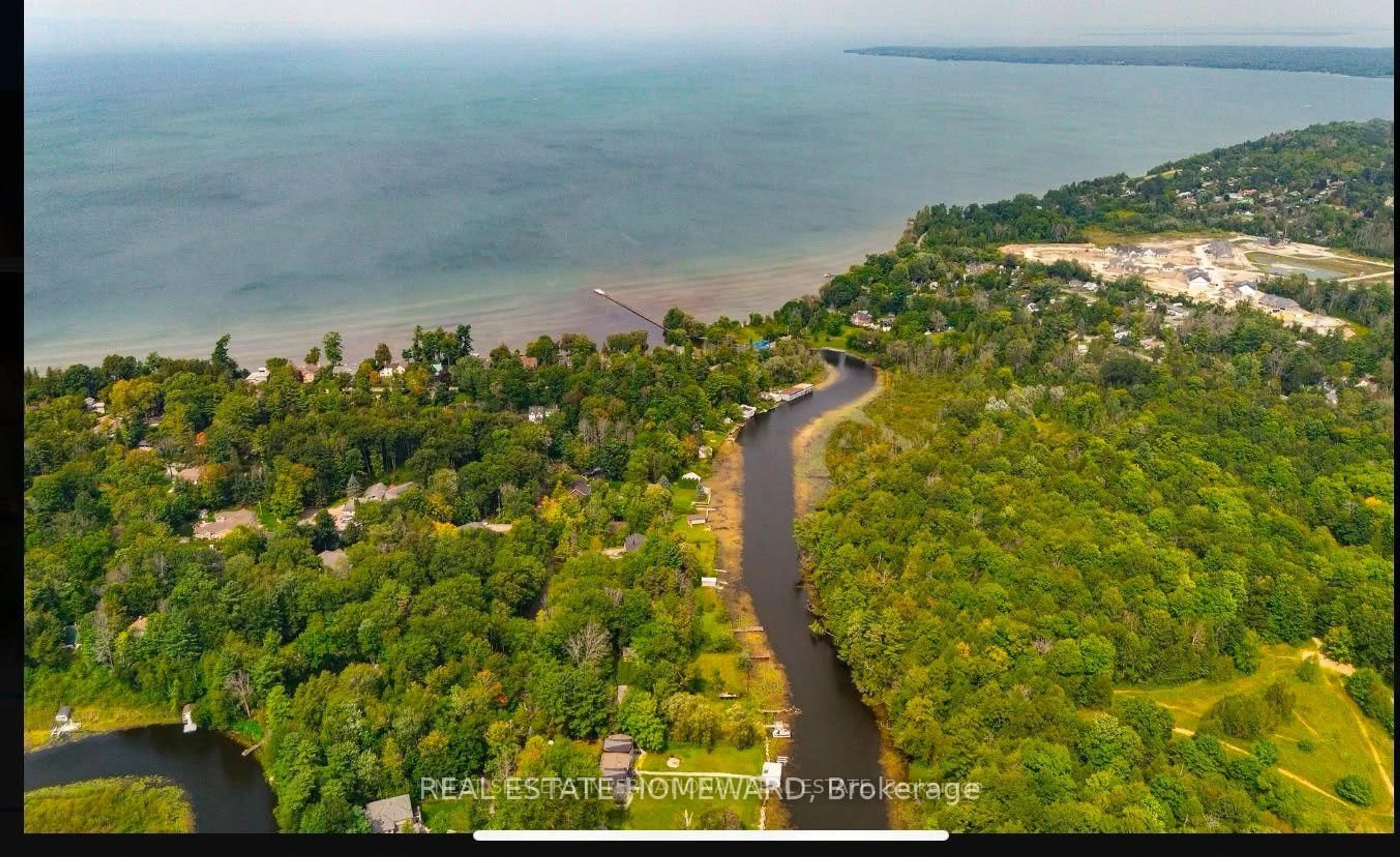 A pic from outside/outdoor area/front of a property/back of a property/a pic from drone, water/lake/river/ocean view for 87 Sibbald Cres, Georgina Ontario L0E 1R0