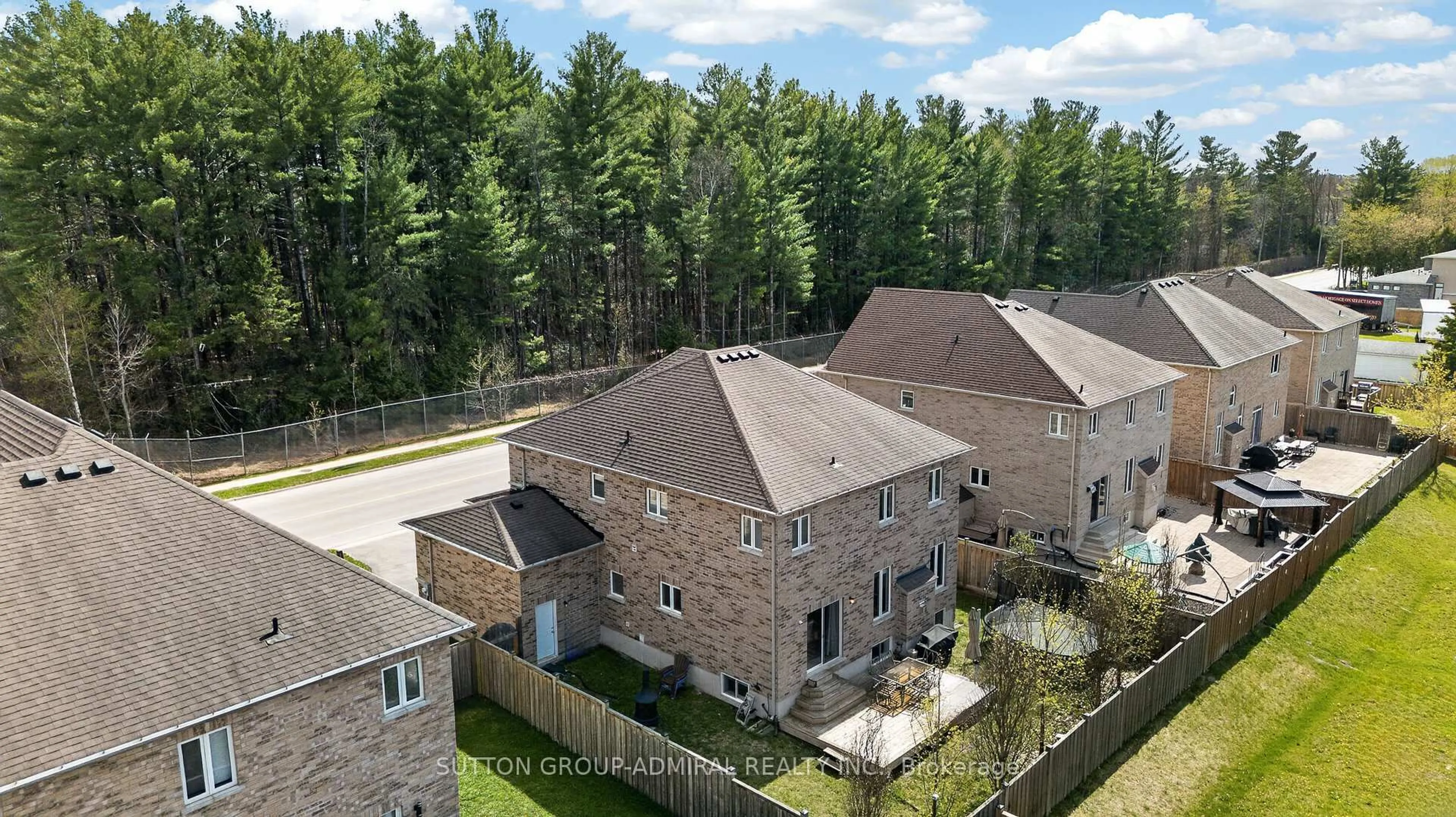 A pic from outside/outdoor area/front of a property/back of a property/a pic from drone, unknown for 121 Centre St, Essa Ontario L0M 1B0