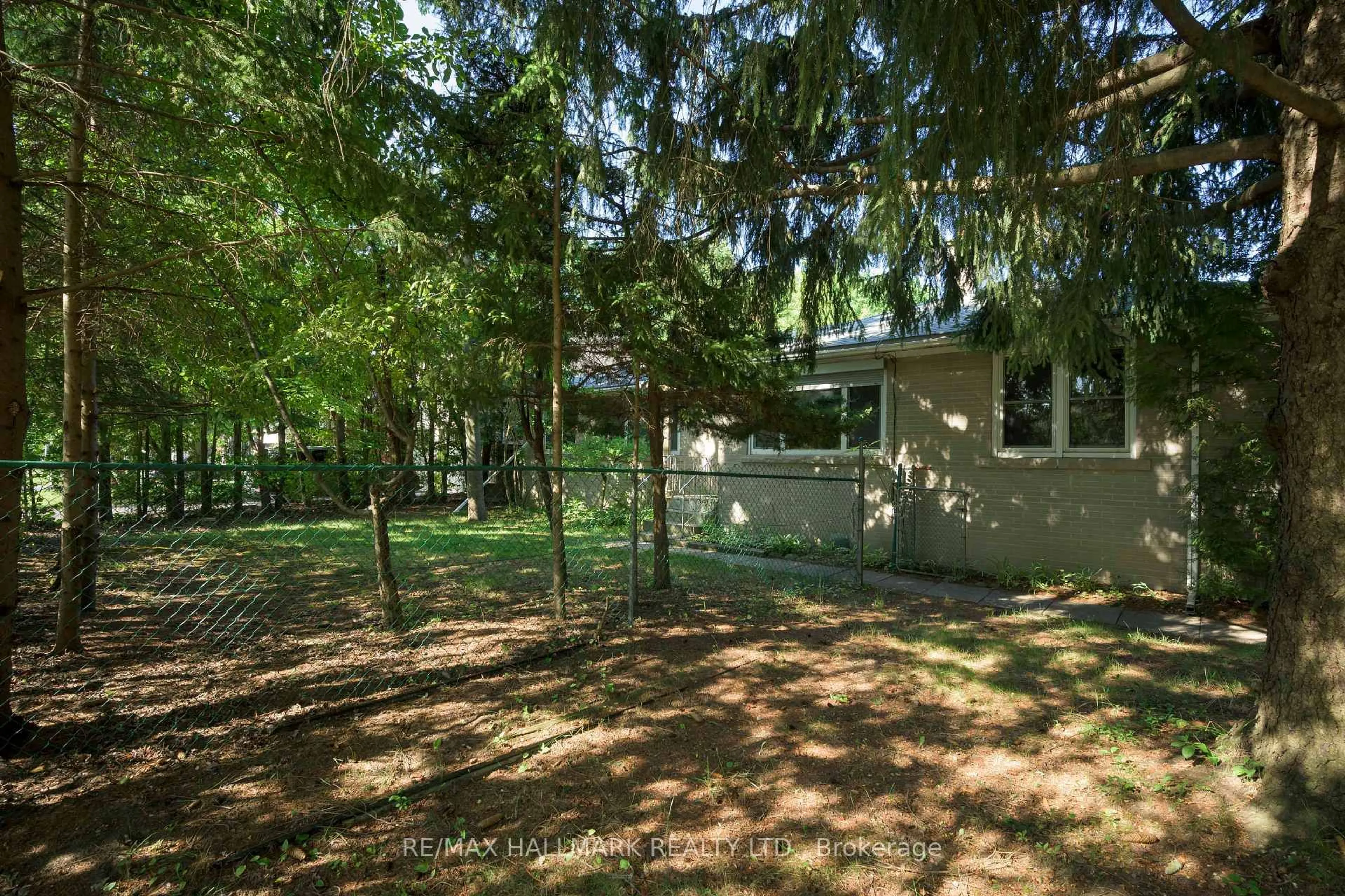 A pic from outside/outdoor area/front of a property/back of a property/a pic from drone, forest/trees view for 4 Crestview Rd, King Ontario L0G 1N0