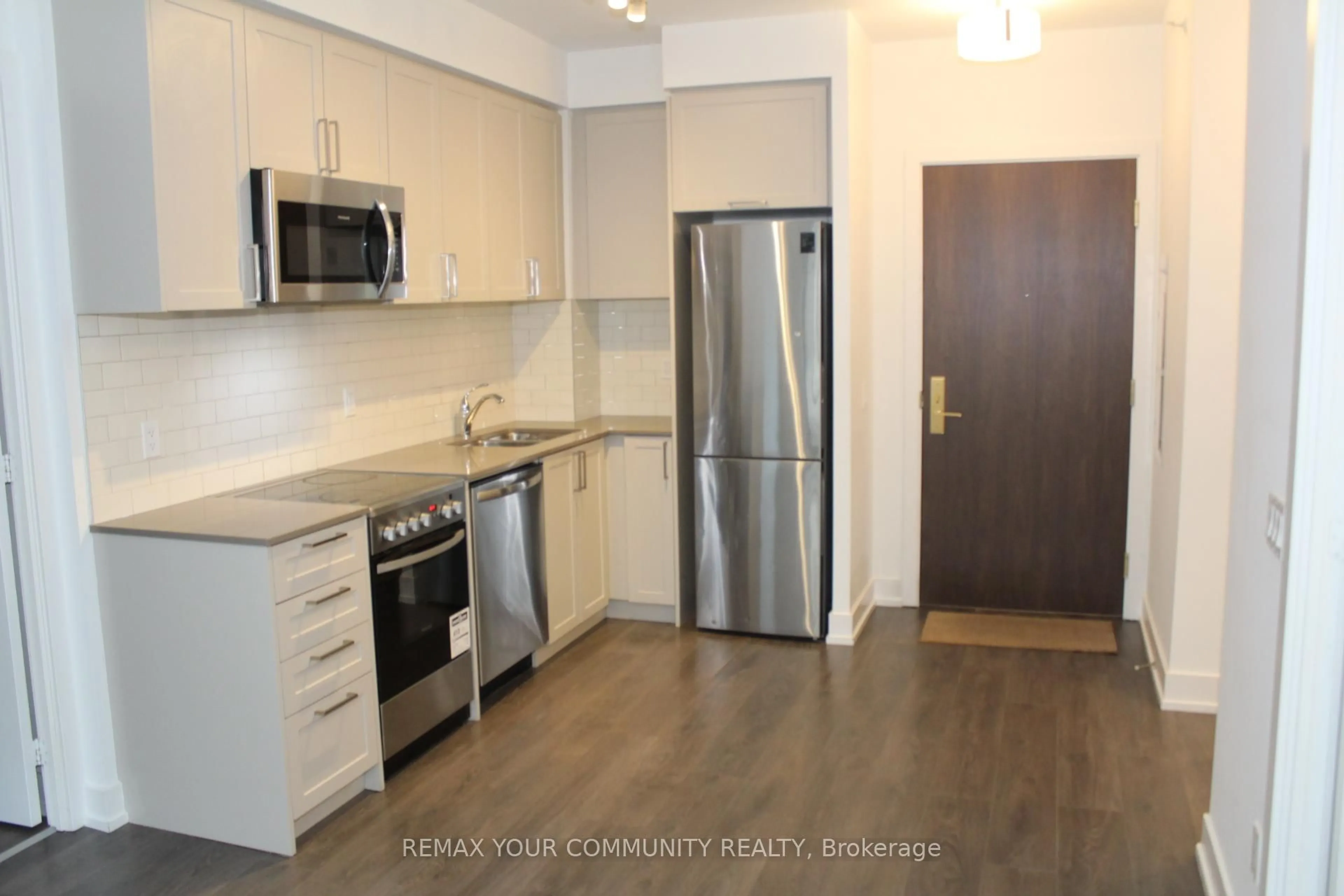 Standard kitchen, wood/laminate floor for 268 Buchanan Dr #203W, Markham Ontario L3R 8G9