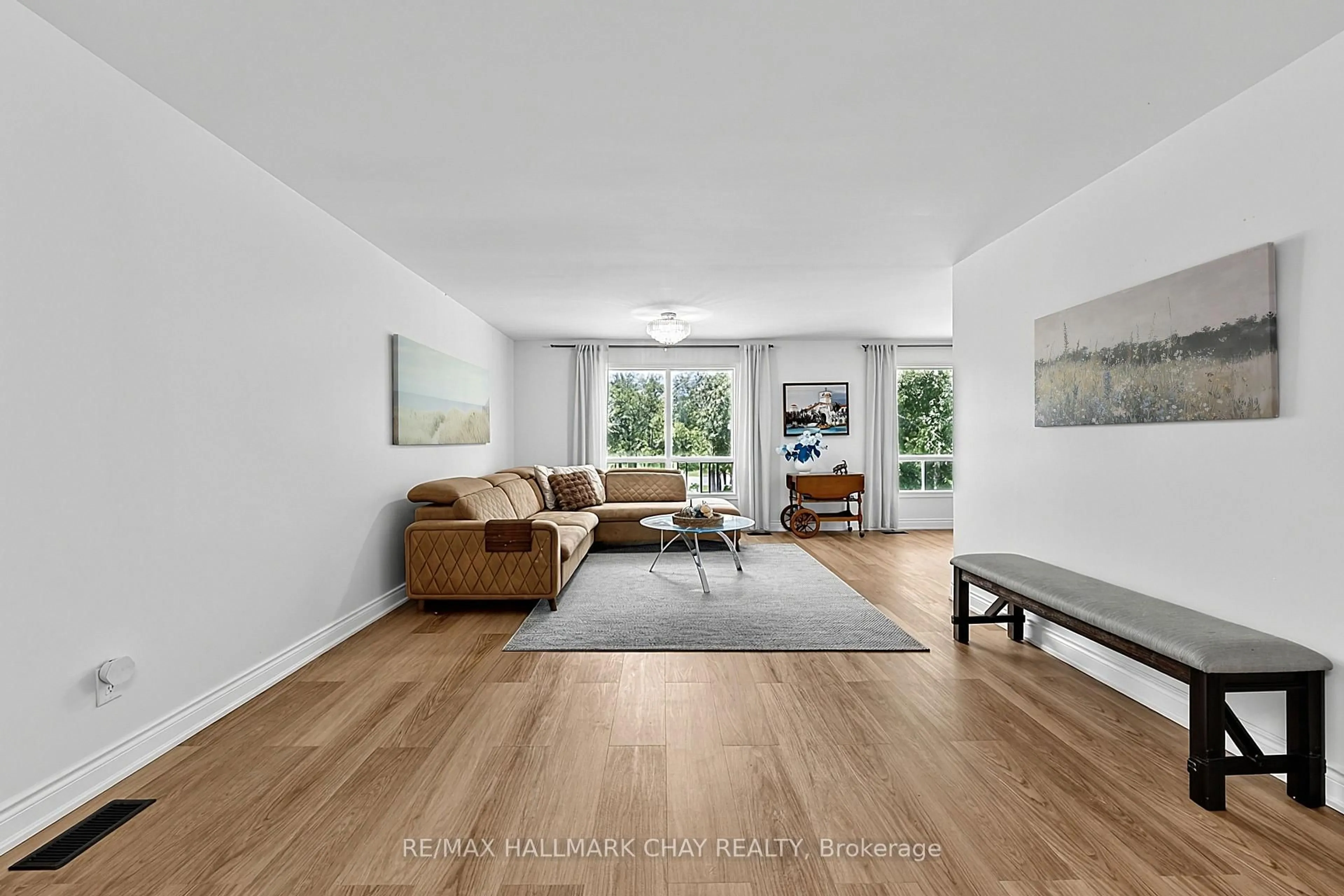 Living room with furniture, unknown for 631 Lockhart Rd, Innisfil Ontario L9S 3E5