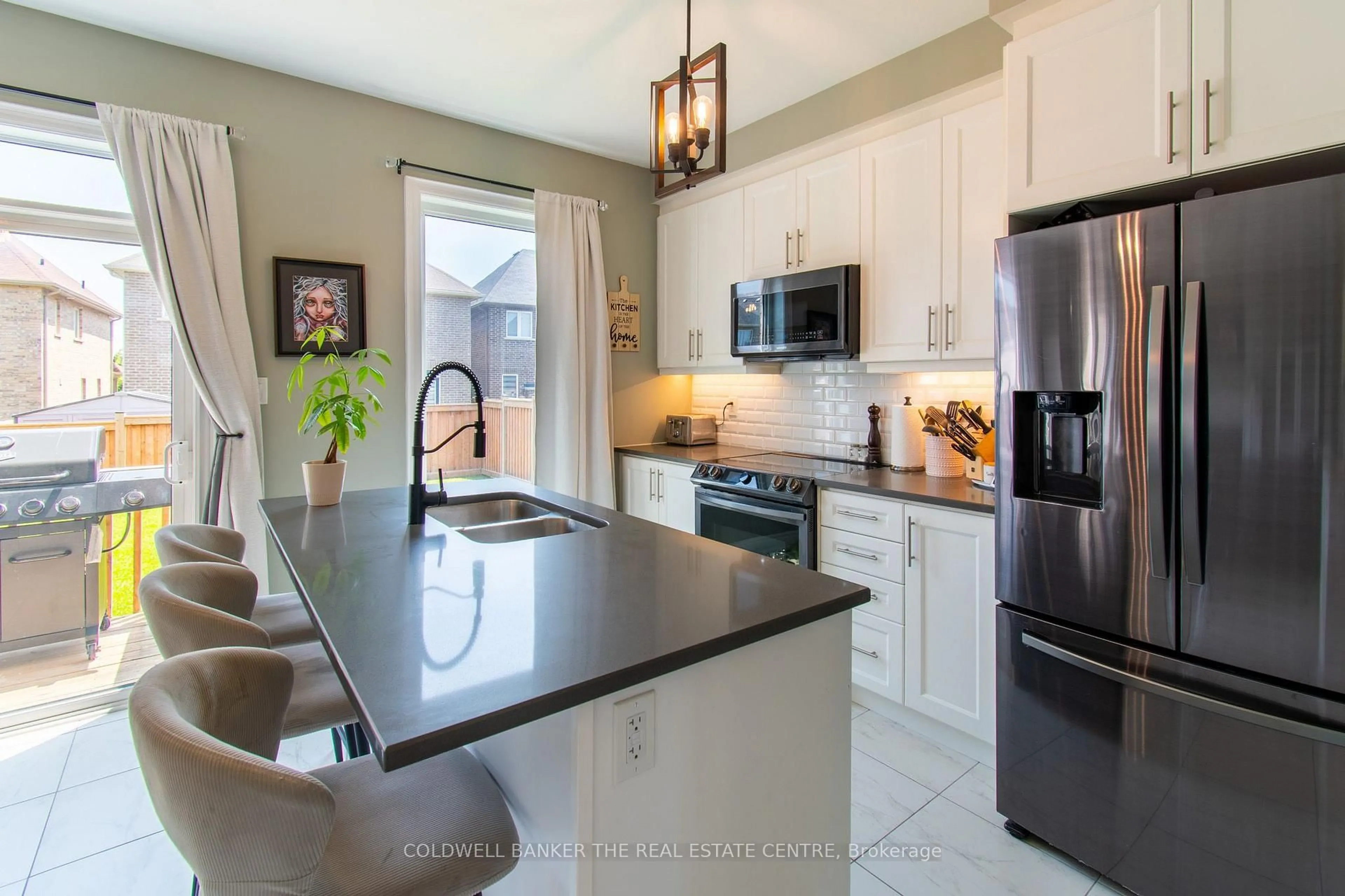 Open concept kitchen, ceramic/tile floor for 780 Green St, Innisfil Ontario L0L 1W0