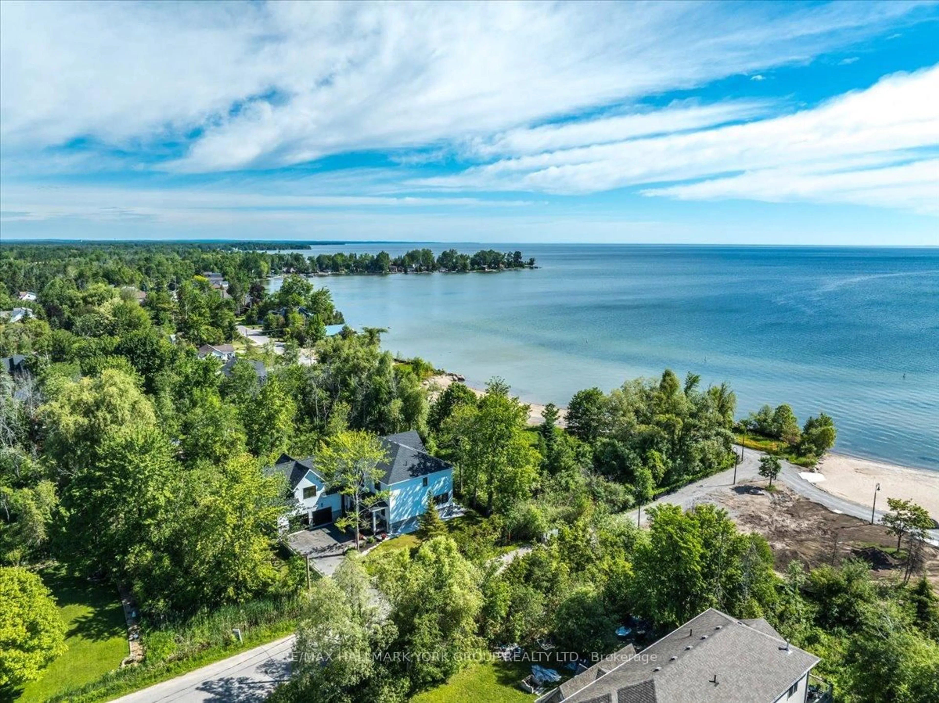 A pic from outside/outdoor area/front of a property/back of a property/a pic from drone, water/lake/river/ocean view for 668 Florence Rd, Innisfil Ontario L9S 2E3