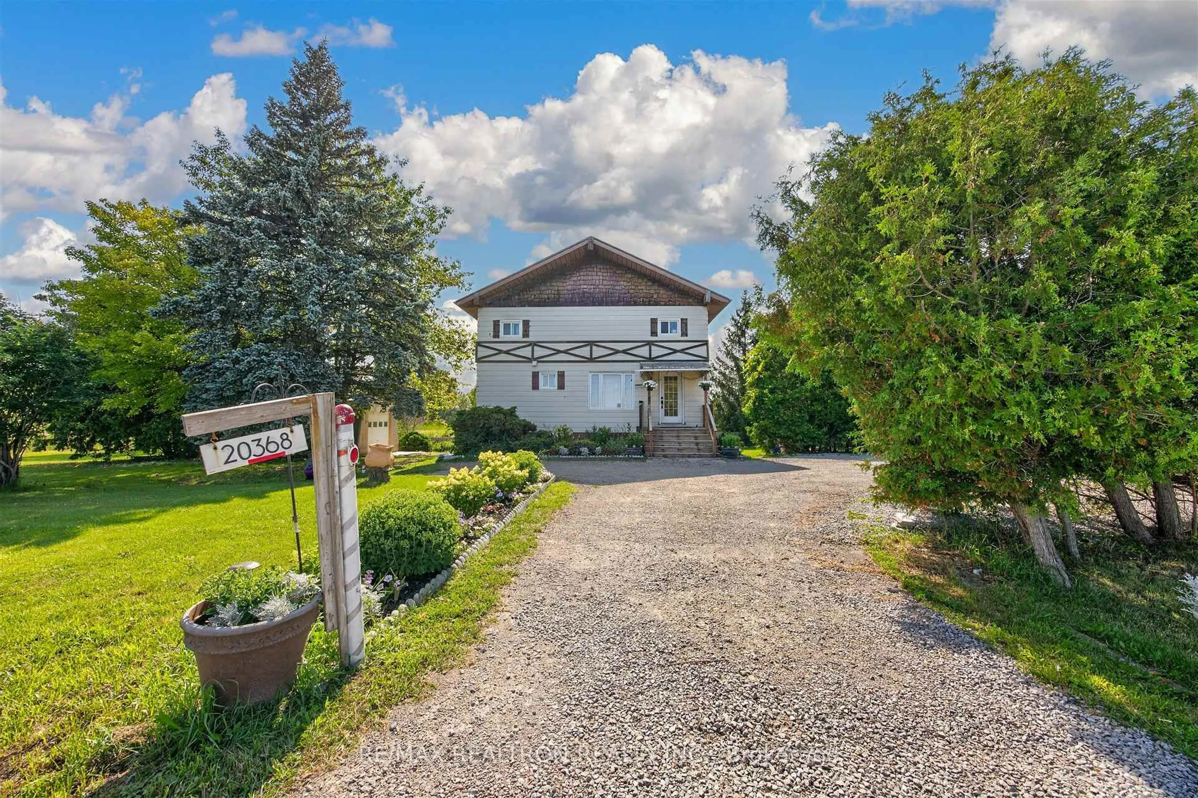 A pic from outside/outdoor area/front of a property/back of a property/a pic from drone, street for 20368 Woodbine Ave, East Gwillimbury Ontario L0G 1R0