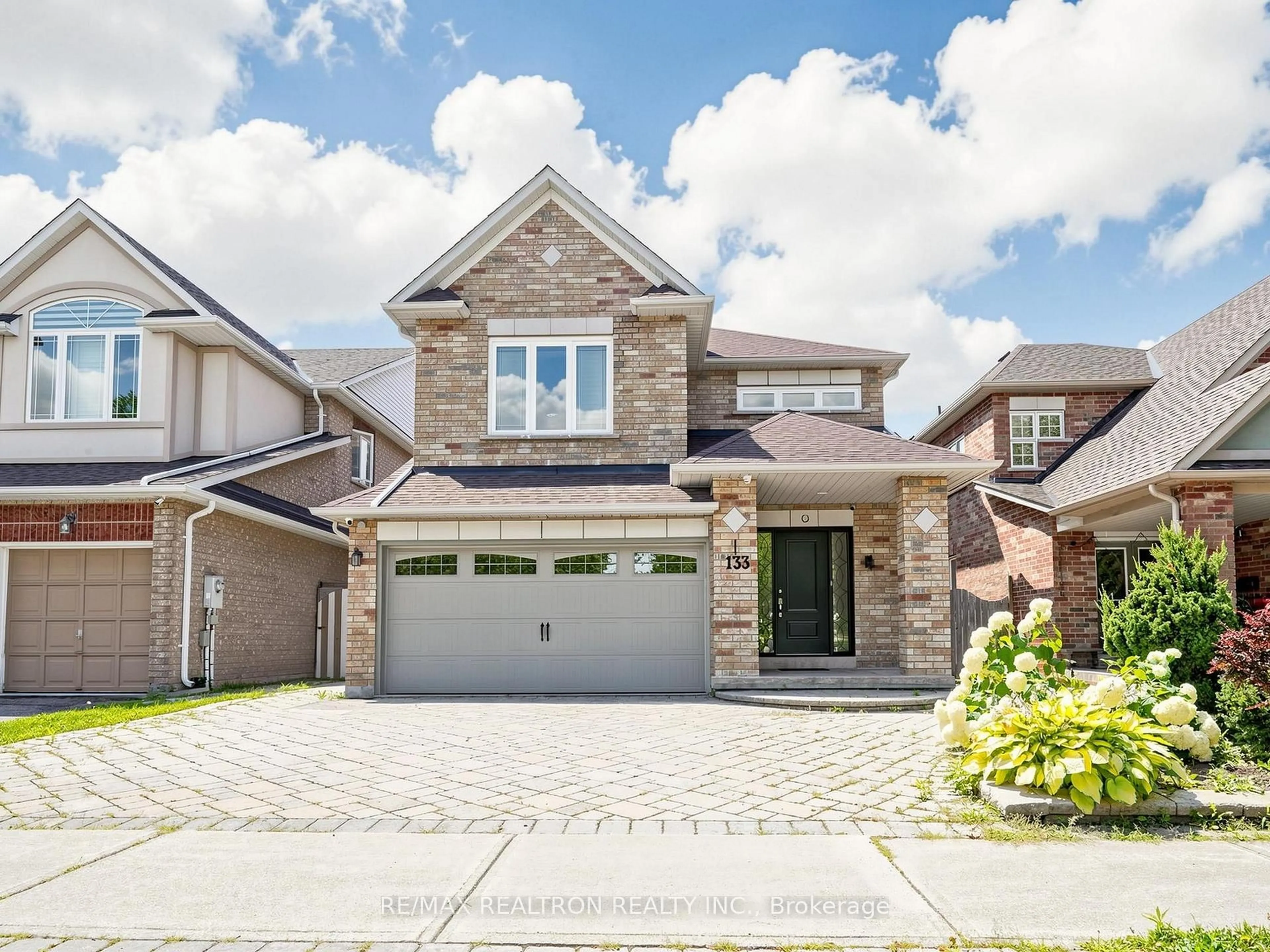 Home with brick exterior material, street for 133 Russell Jarvis Dr, Markham Ontario L3S 4L1