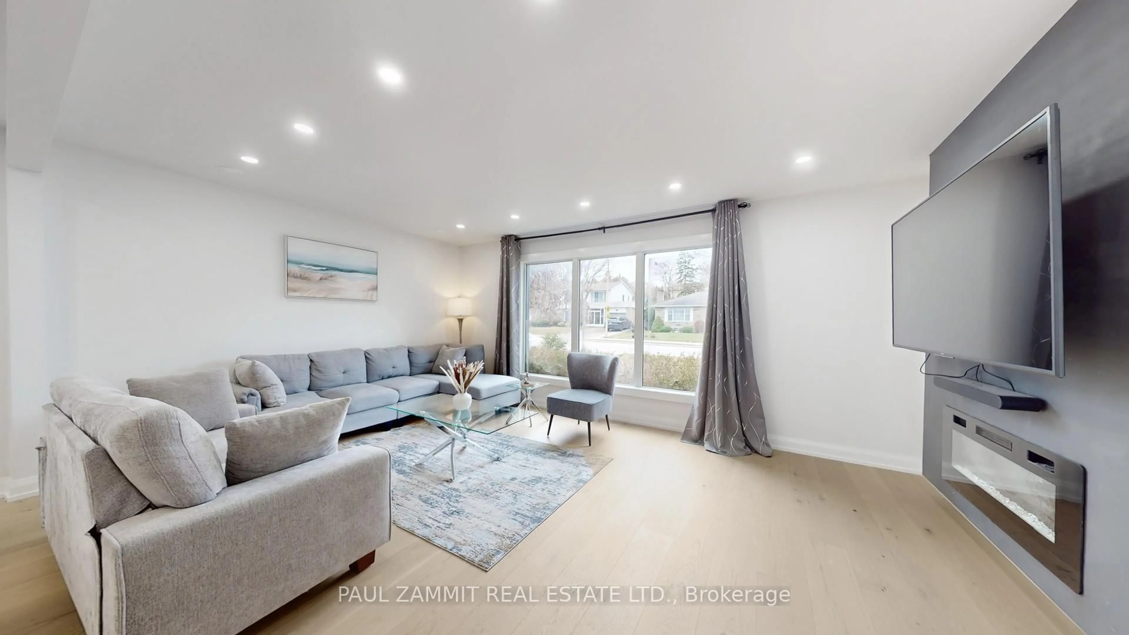 Living room with furniture, wood/laminate floor for 31 Henderson Ave, Markham Ontario L3T 2K5