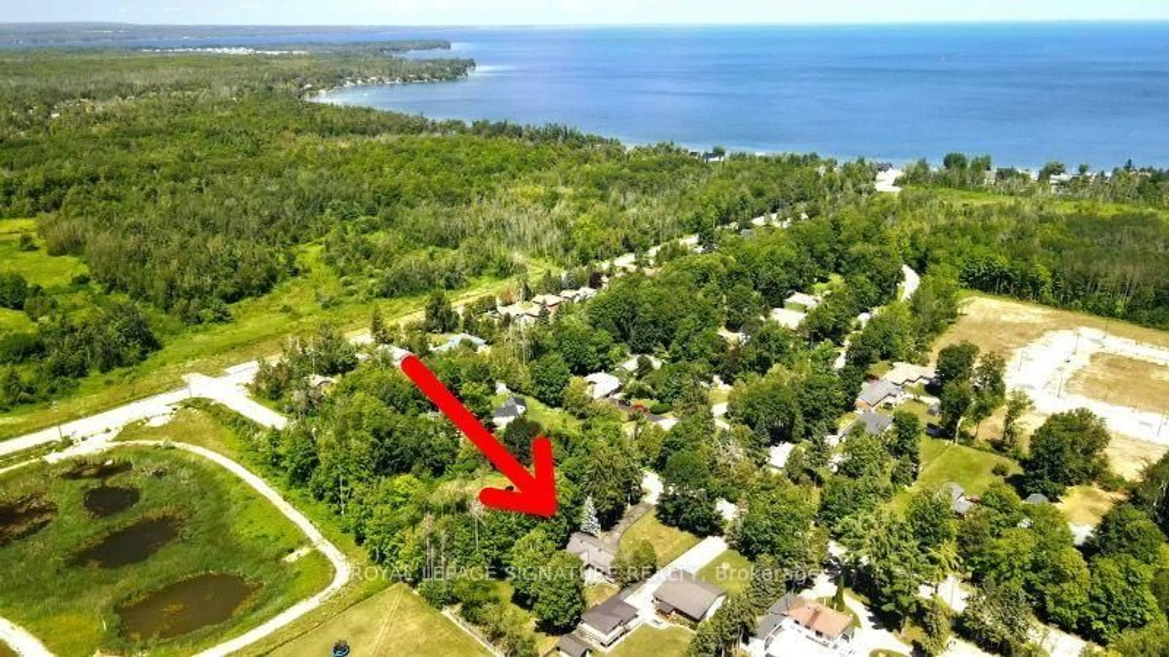 A pic from outside/outdoor area/front of a property/back of a property/a pic from drone, water/lake/river/ocean view for 2948 Lillian St, Innisfil Ontario L9S 2J6
