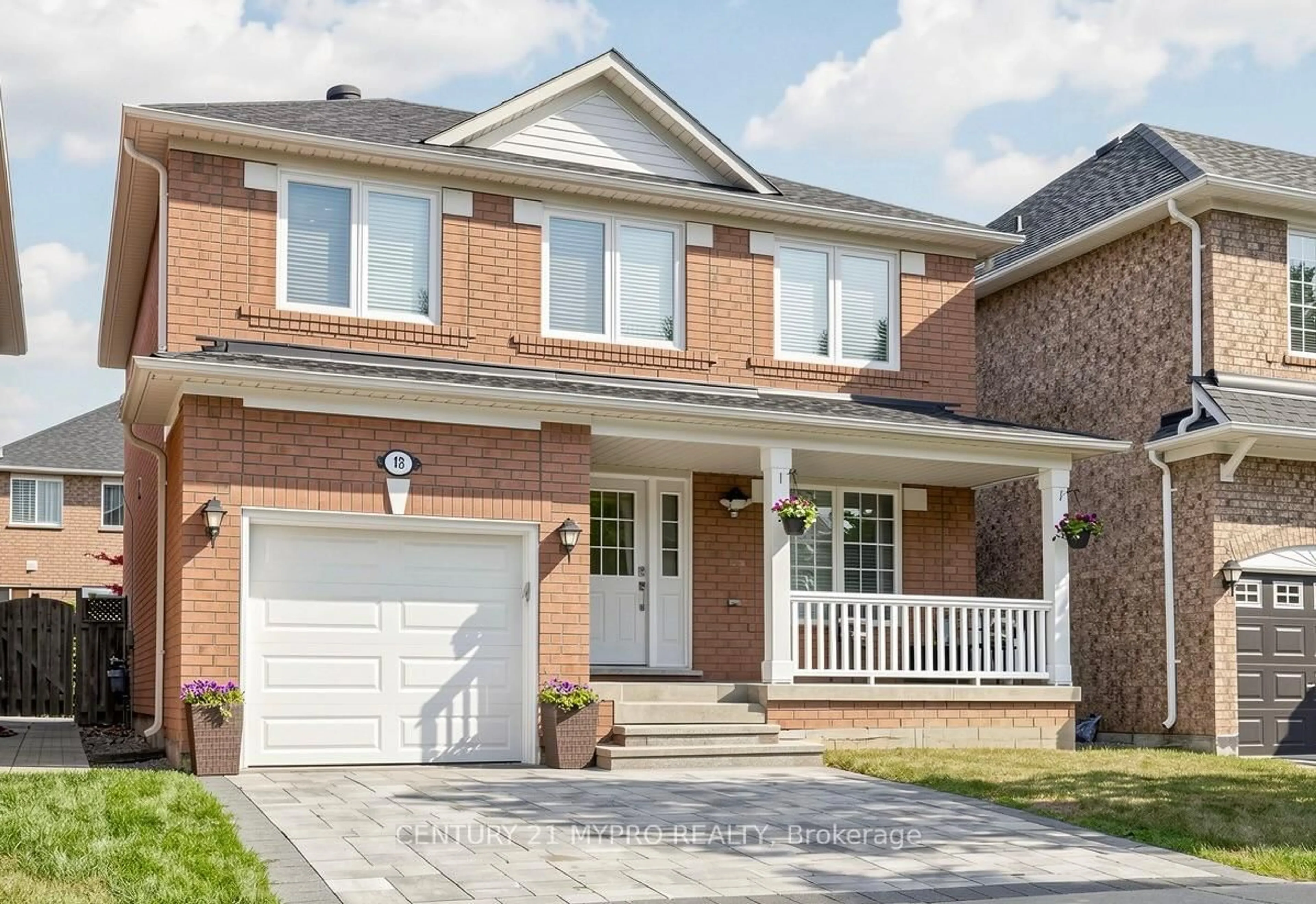 Home with brick exterior material, street for 18 Dogwood St, Markham Ontario L6E 1C9