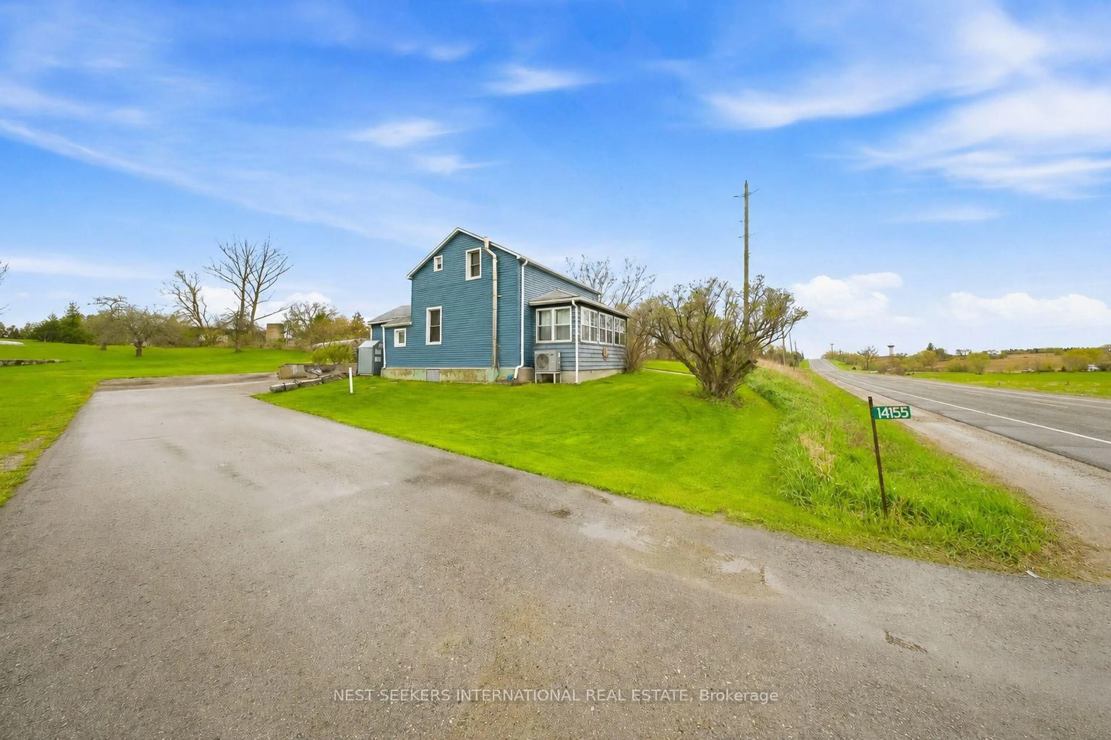 A pic from outside/outdoor area/front of a property/back of a property/a pic from drone, water/lake/river/ocean view for 14155 Highway 27, King Ontario L0G 1T0
