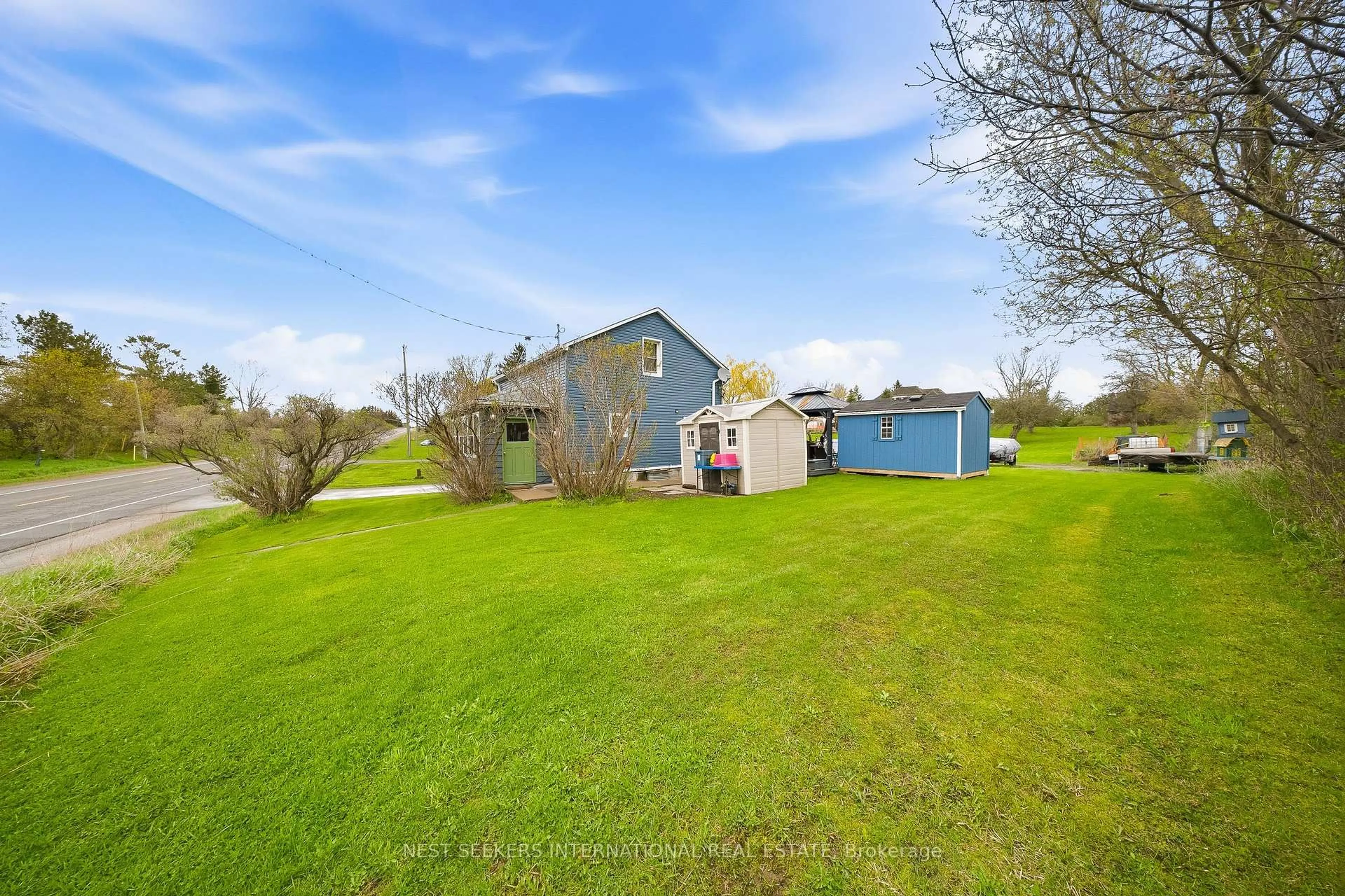 A pic from outside/outdoor area/front of a property/back of a property/a pic from drone, water/lake/river/ocean view for 14155 Highway 27, King Ontario L0G 1T0