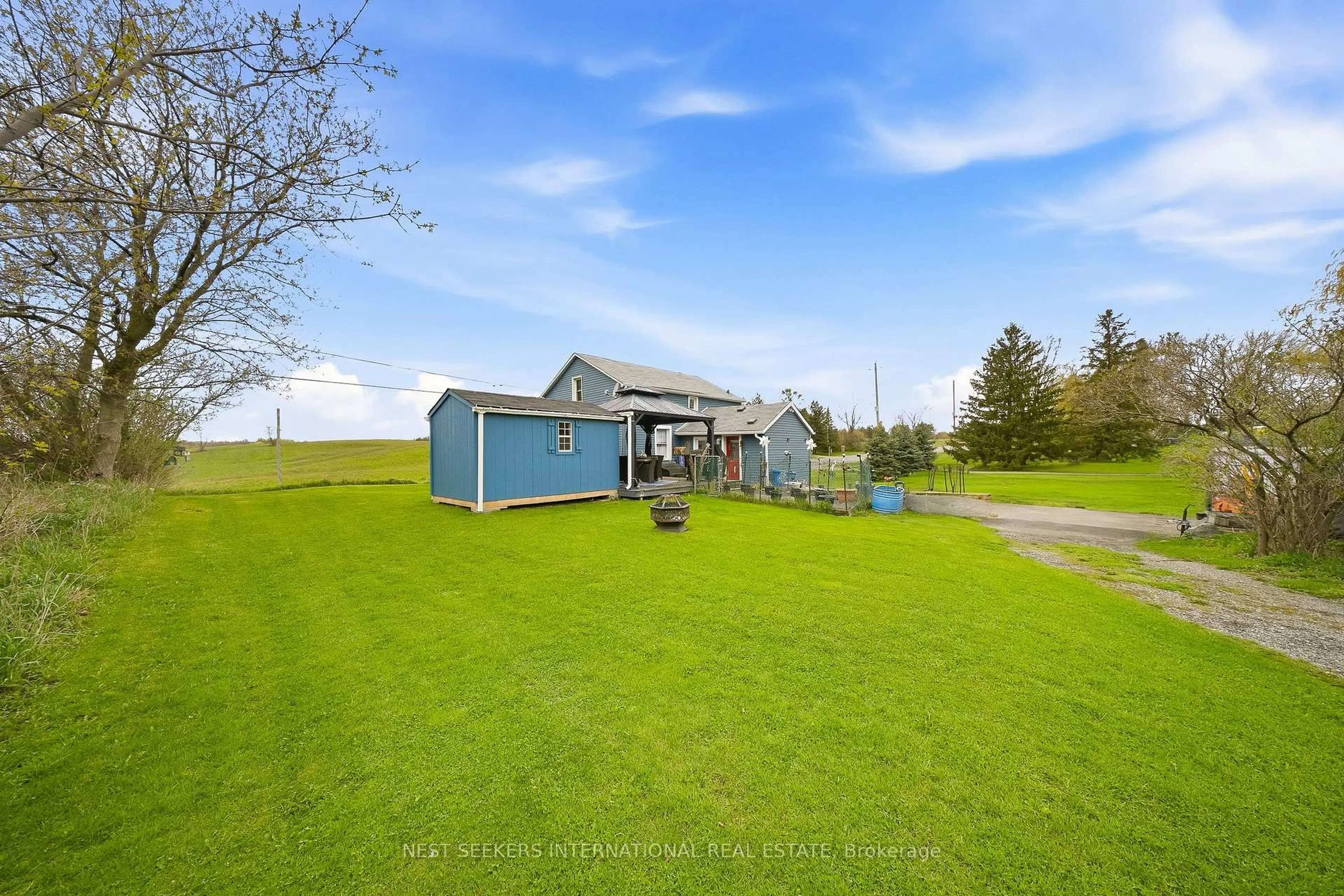 A pic from outside/outdoor area/front of a property/back of a property/a pic from drone, unknown for 14155 Highway 27, King Ontario L0G 1T0