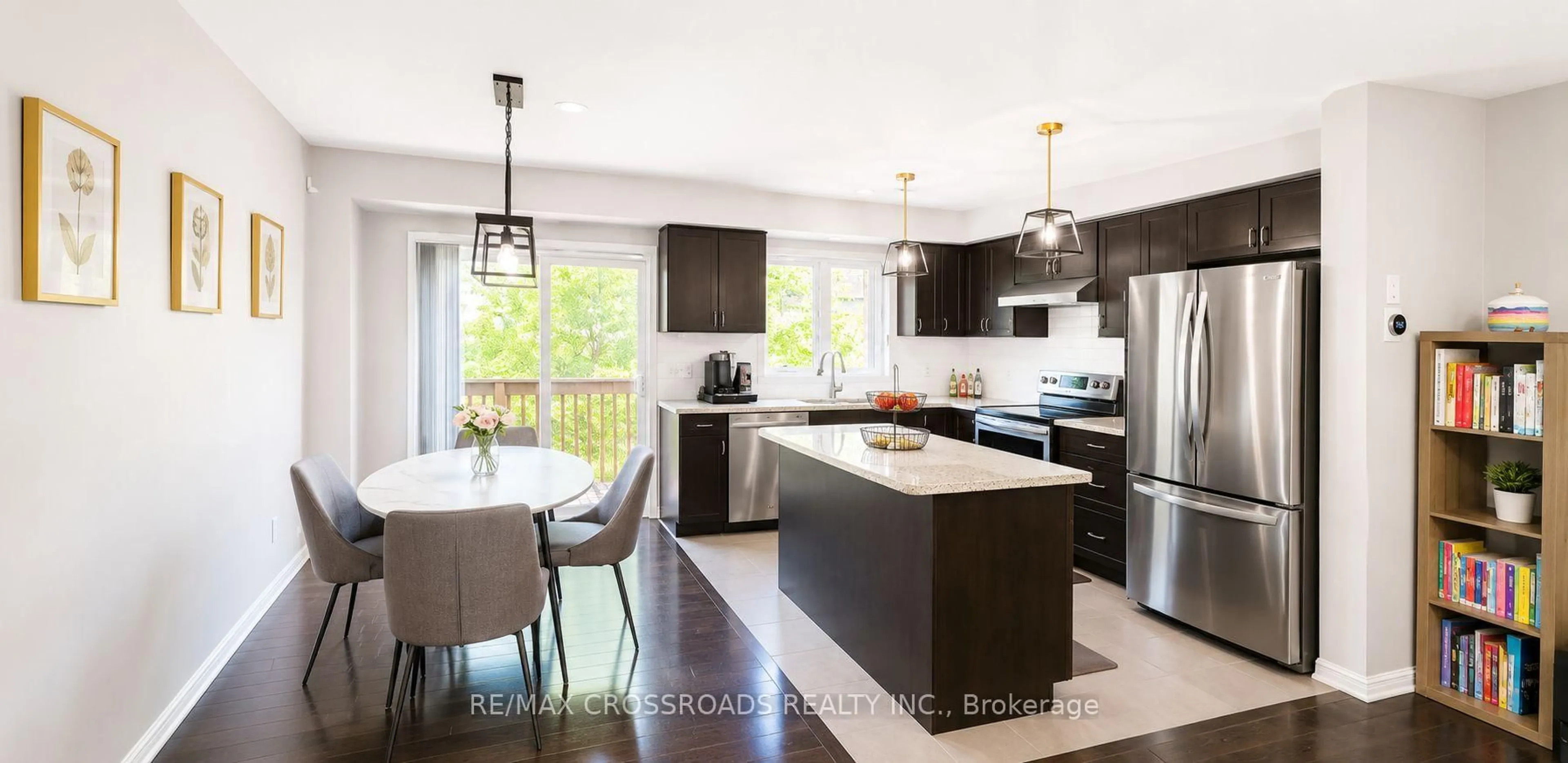 Open concept kitchen, wood/laminate floor for 53 Edwin Pearson St, Aurora Ontario L4G 0S2