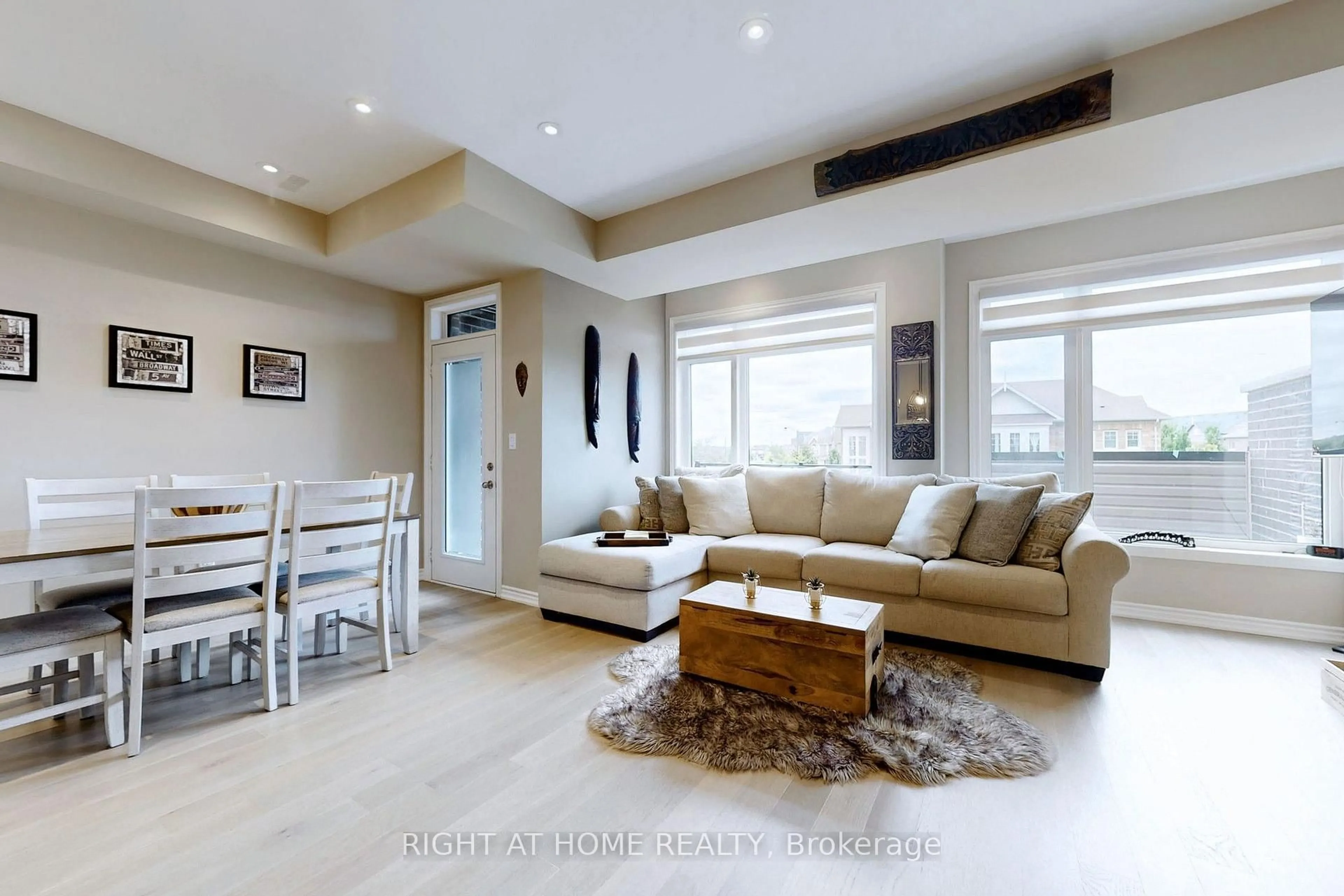 Living room with furniture, wood/laminate floor for 279 Moody Dr, Vaughan Ontario L4H 3N5