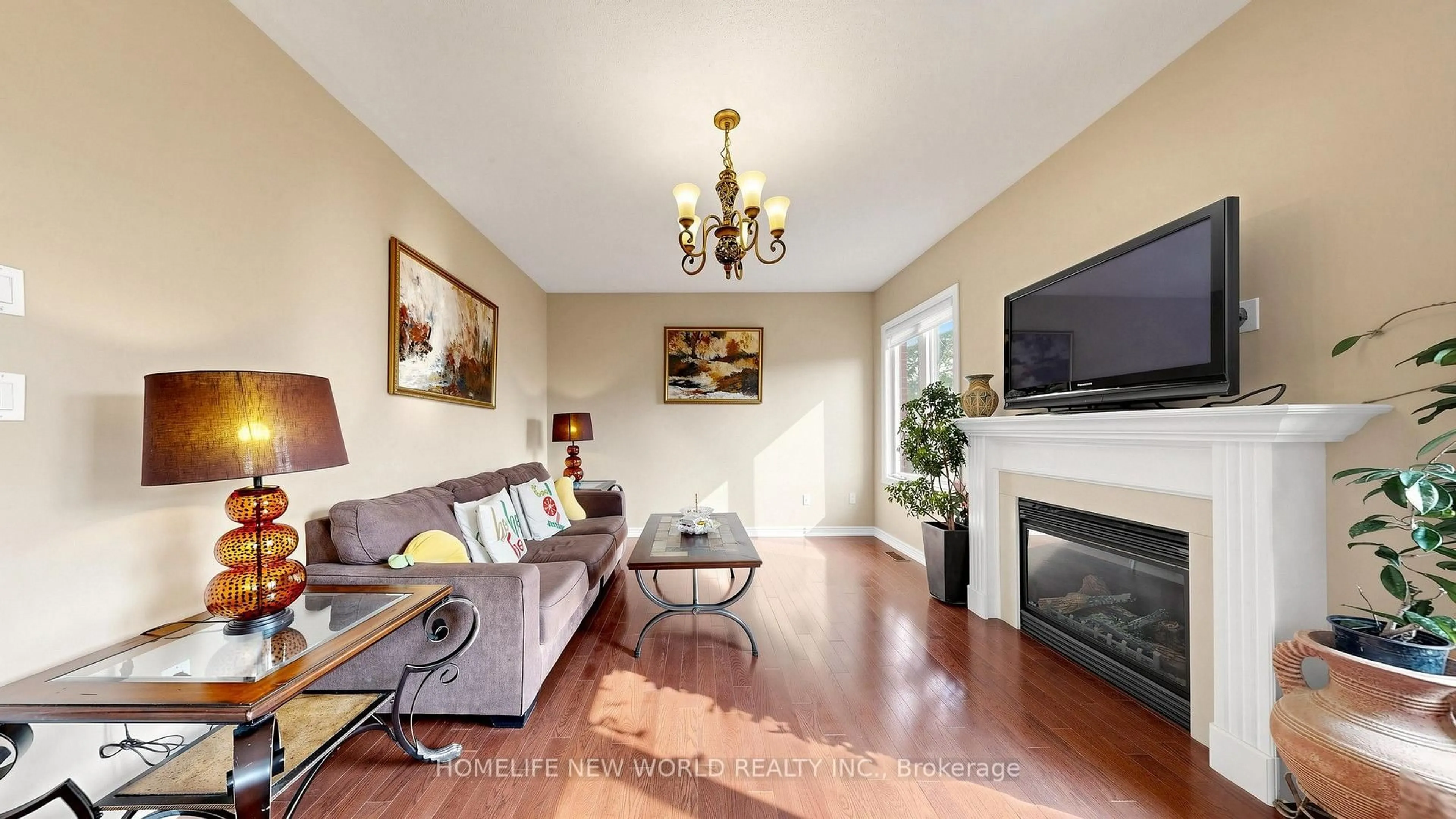 Living room with furniture, wood/laminate floor for 663 Peter Rupert Ave, Vaughan Ontario L6A 0S2