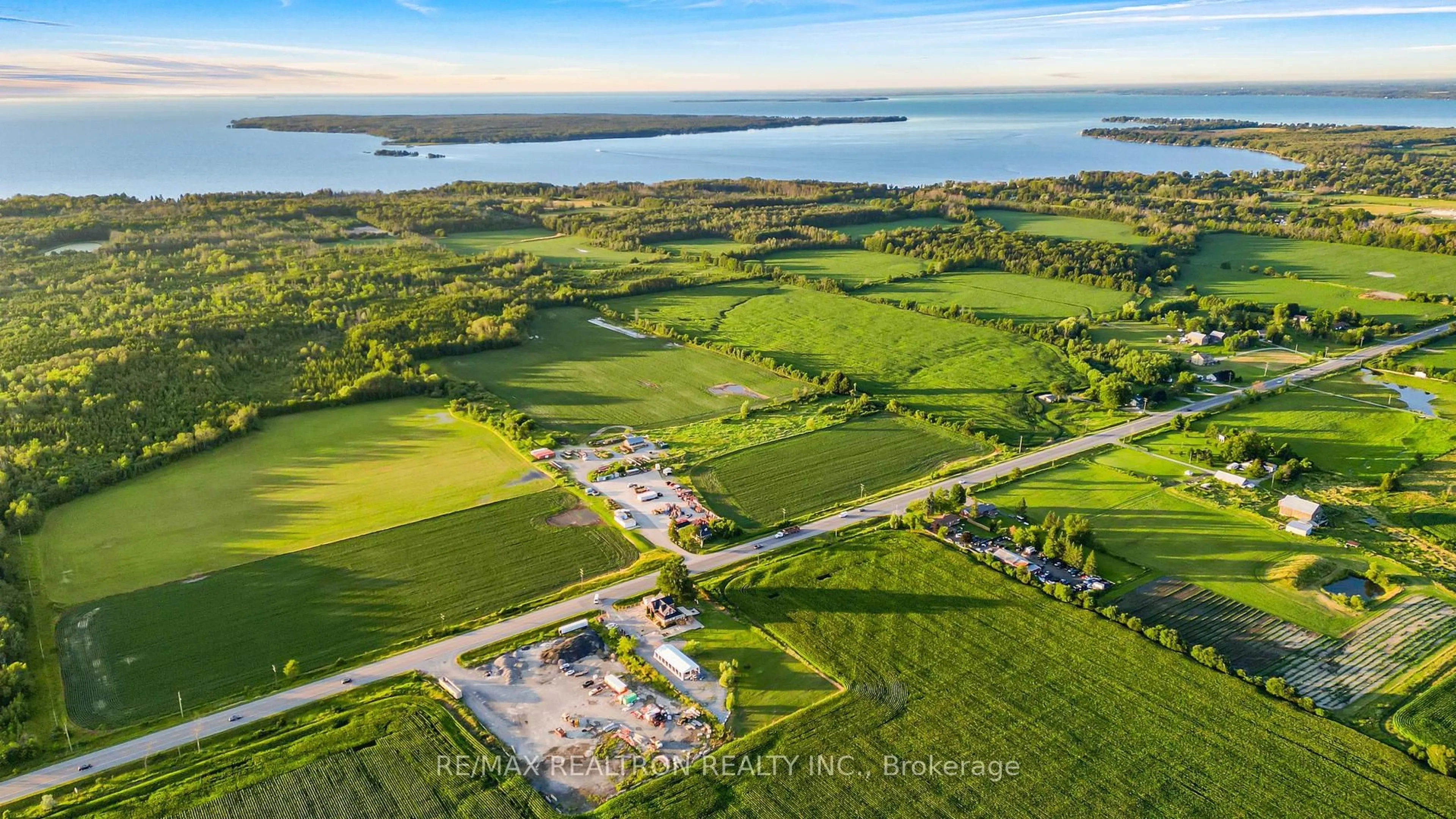 A pic from outside/outdoor area/front of a property/back of a property/a pic from drone, water/lake/river/ocean view for 27453 Highway 48, Georgina Ontario L0E 1R0