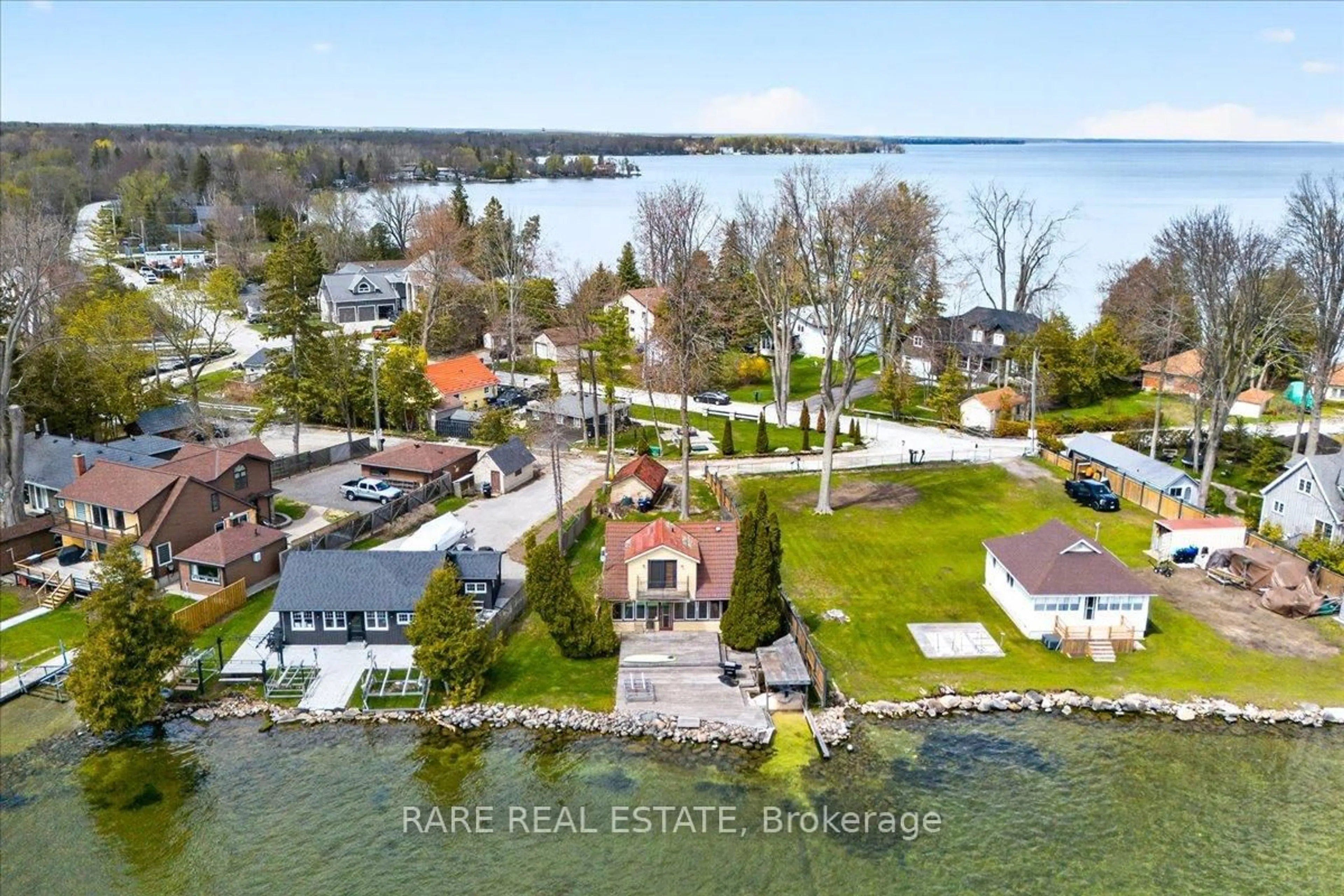 A pic from outside/outdoor area/front of a property/back of a property/a pic from drone, water/lake/river/ocean view for 2350 Bonsecour Ave, Innisfil Ontario L9S 3X3