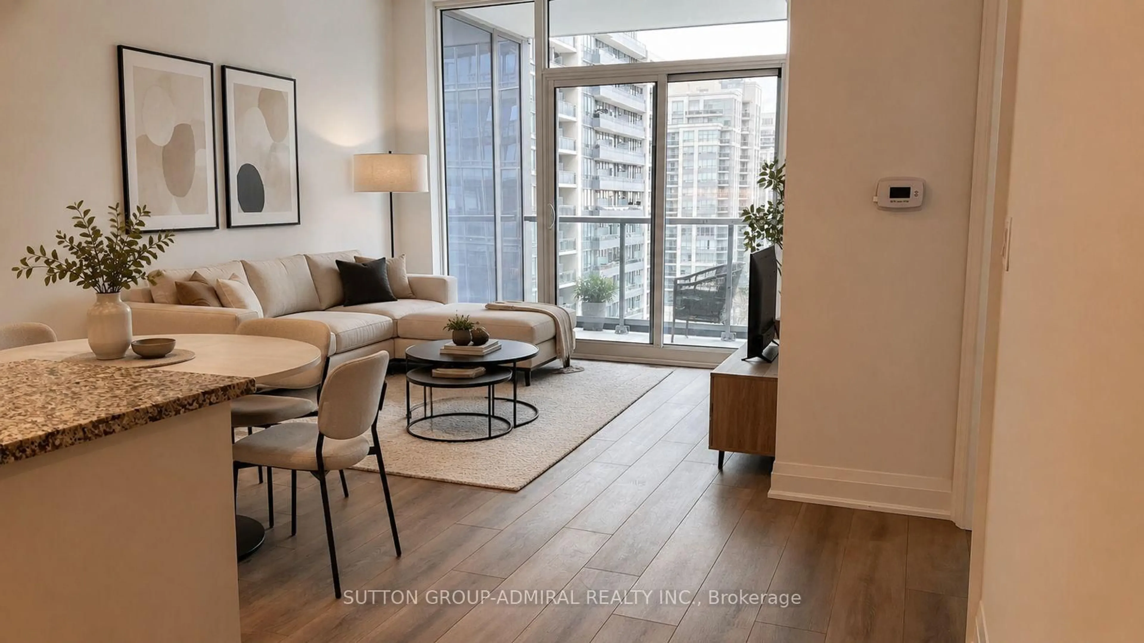 Living room with furniture, wood/laminate floor for 10 Gatineau Dr #913, Vaughan Ontario L4J 0L2