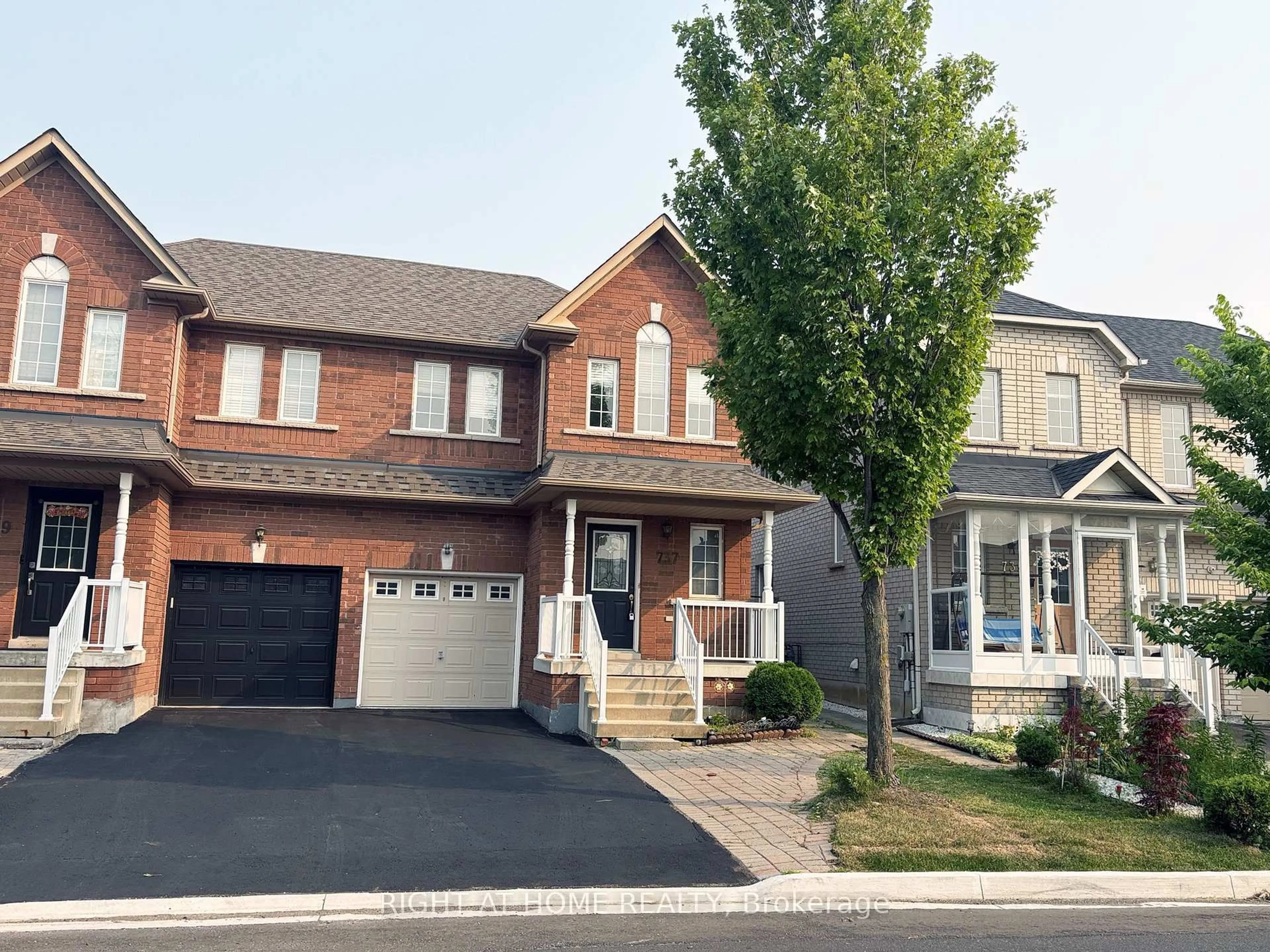 Home with brick exterior material, street for 737 Caboto Tr, Markham Ontario L3R 5W4