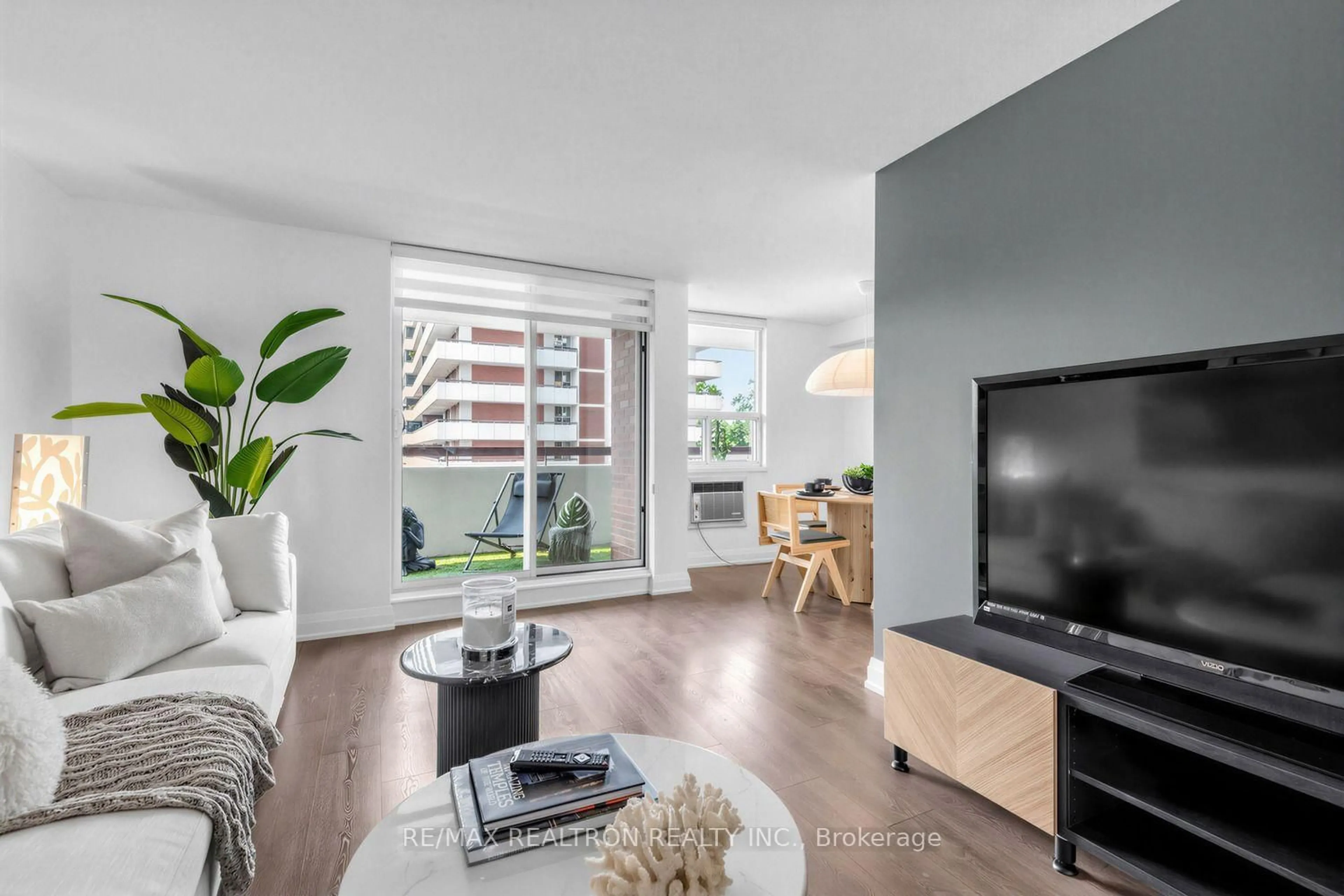Living room with furniture, unknown for 1 Royal Orchard Blvd #211, Markham Ontario L3R 2N7