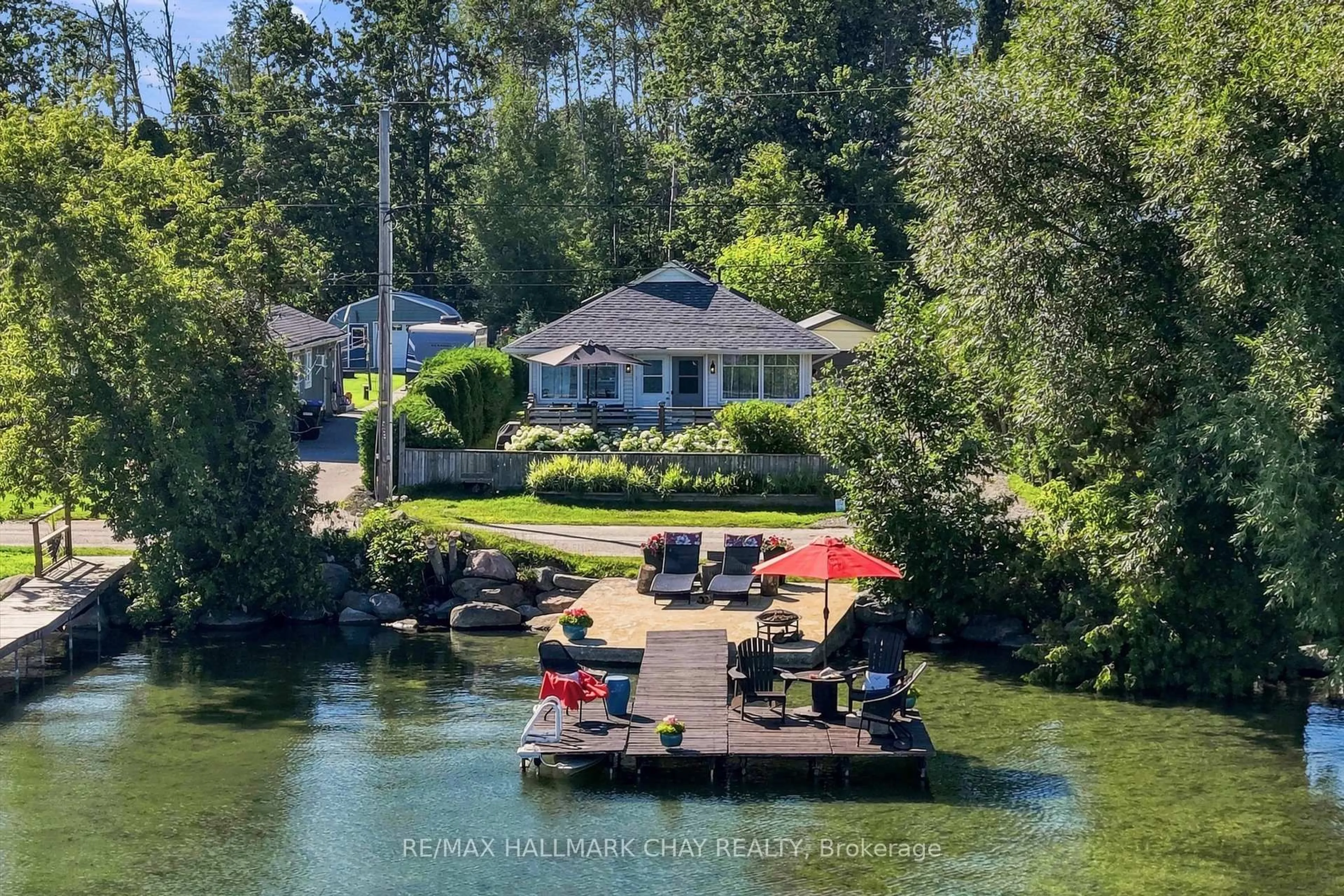 A pic from outside/outdoor area/front of a property/back of a property/a pic from drone, water/lake/river/ocean view for 1064 Wisker Ave, Innisfil Ontario L0L 1W0