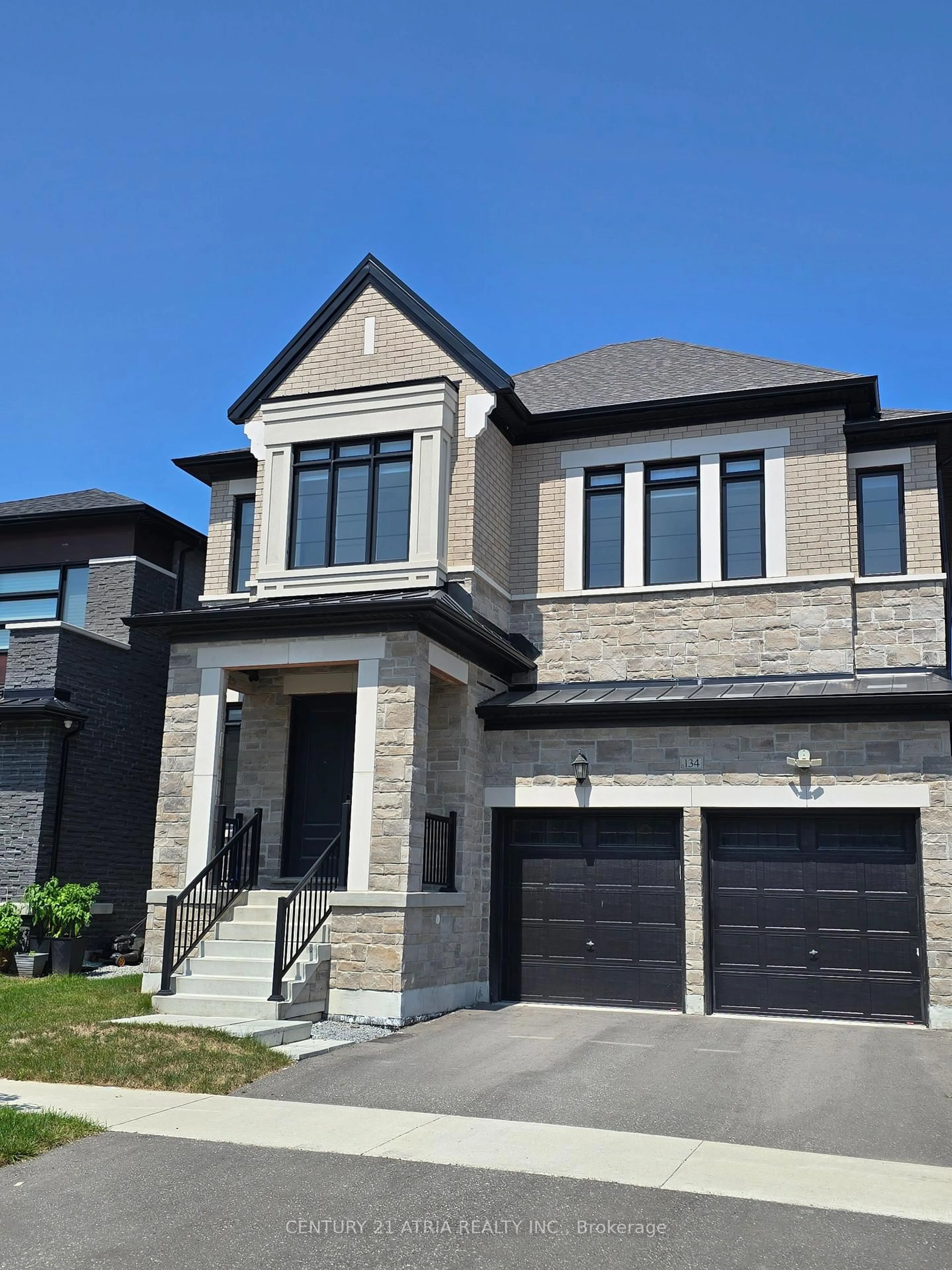 Home with brick exterior material, street for 134 Fallharvest Way, Whitchurch-Stouffville Ontario L4A 5A2