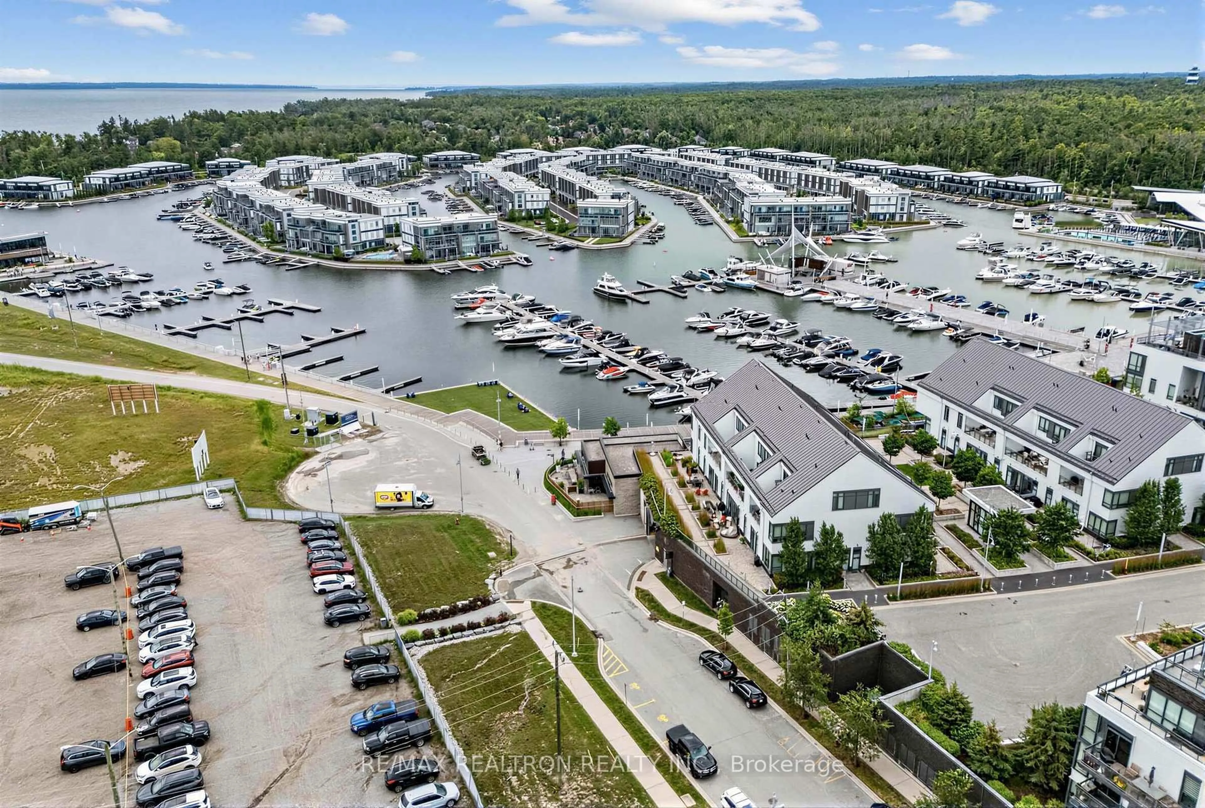 A pic from outside/outdoor area/front of a property/back of a property/a pic from drone, water/lake/river/ocean view for 233 Broward Way #8, Innisfil Ontario L9S 0M5