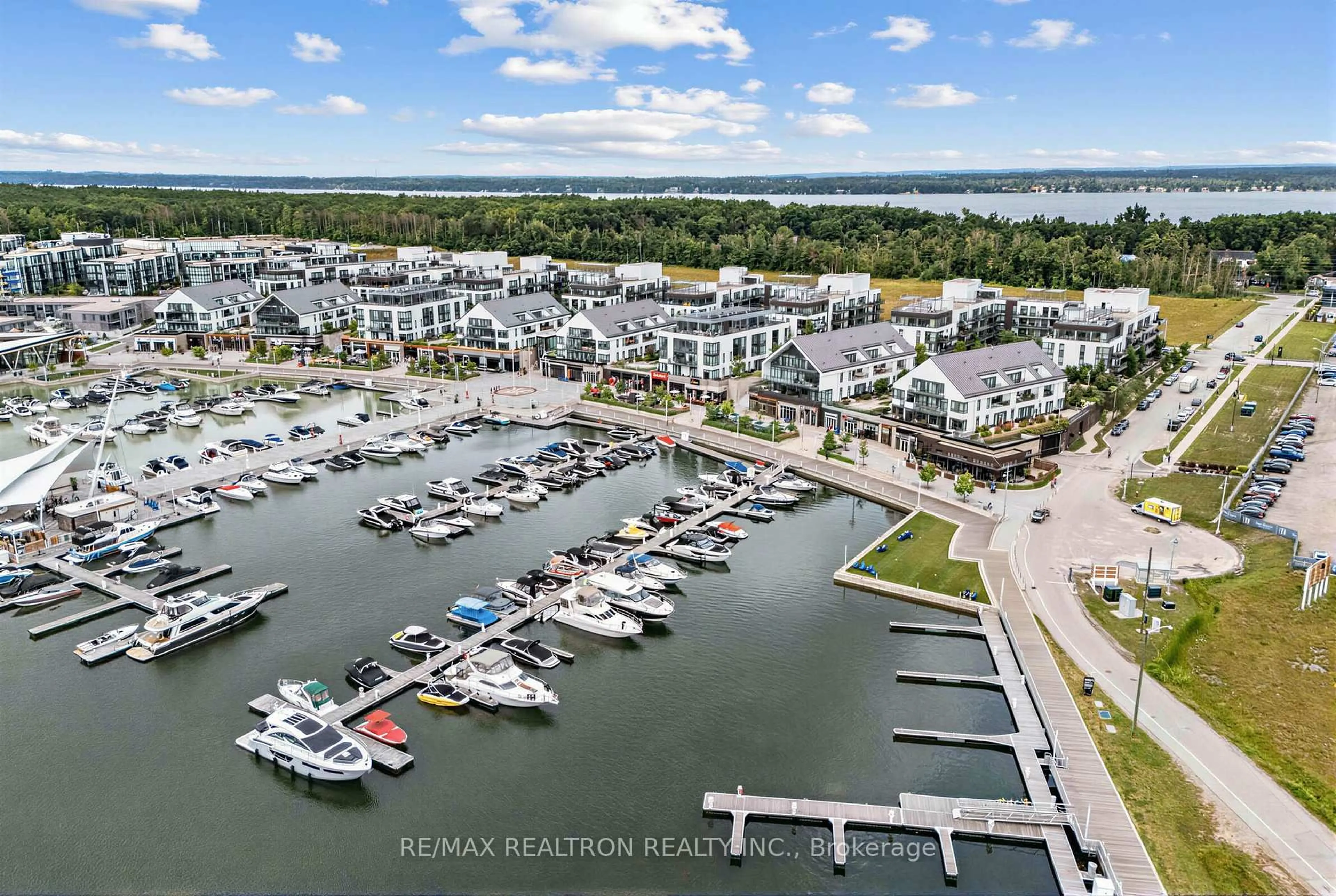 A pic from outside/outdoor area/front of a property/back of a property/a pic from drone, water/lake/river/ocean view for 233 Broward Way #8, Innisfil Ontario L9S 0M5