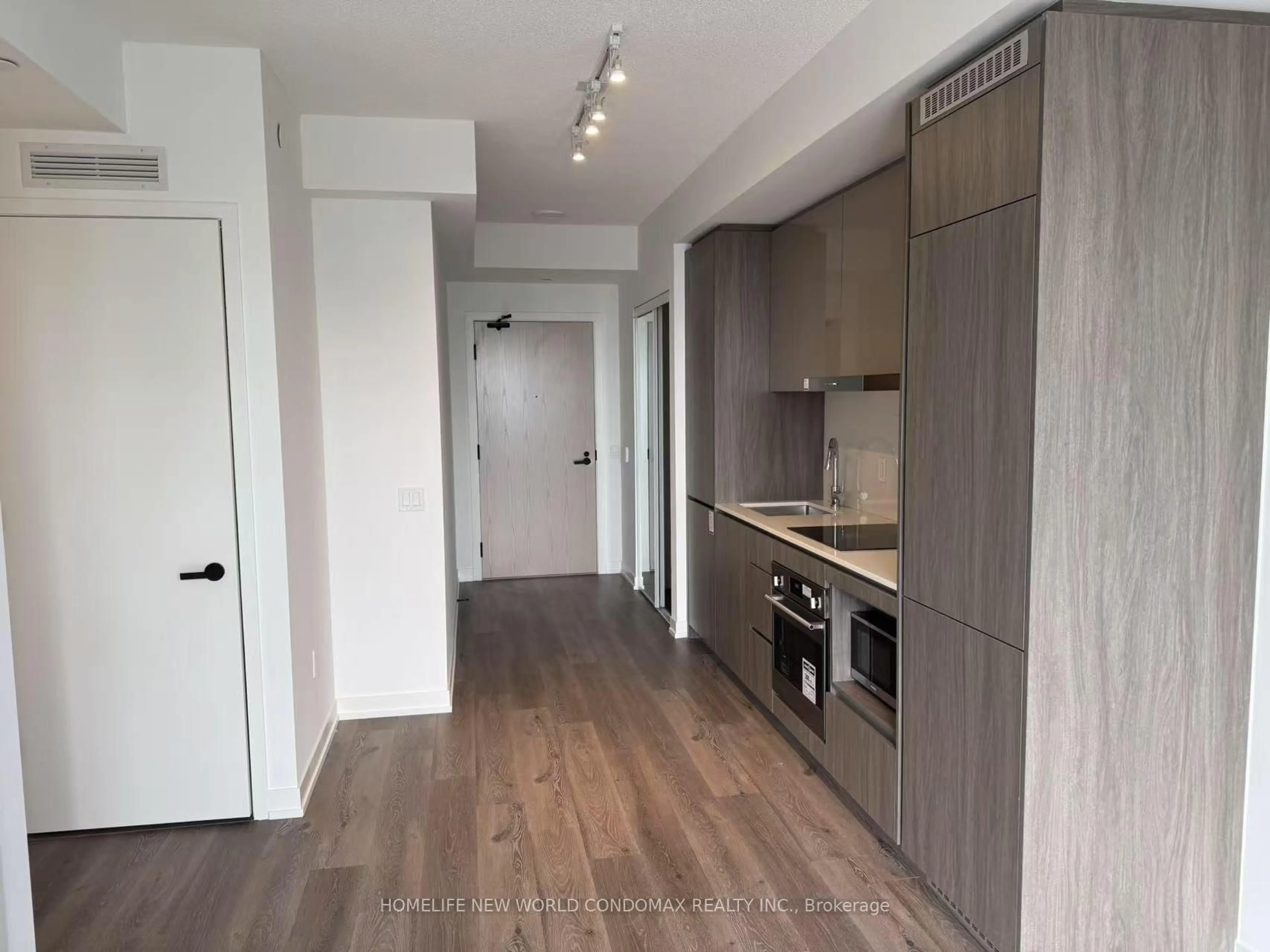 Standard kitchen, wood/laminate floor for 28 Interchange Way #1807, Vaughan Ontario L4K 0R2